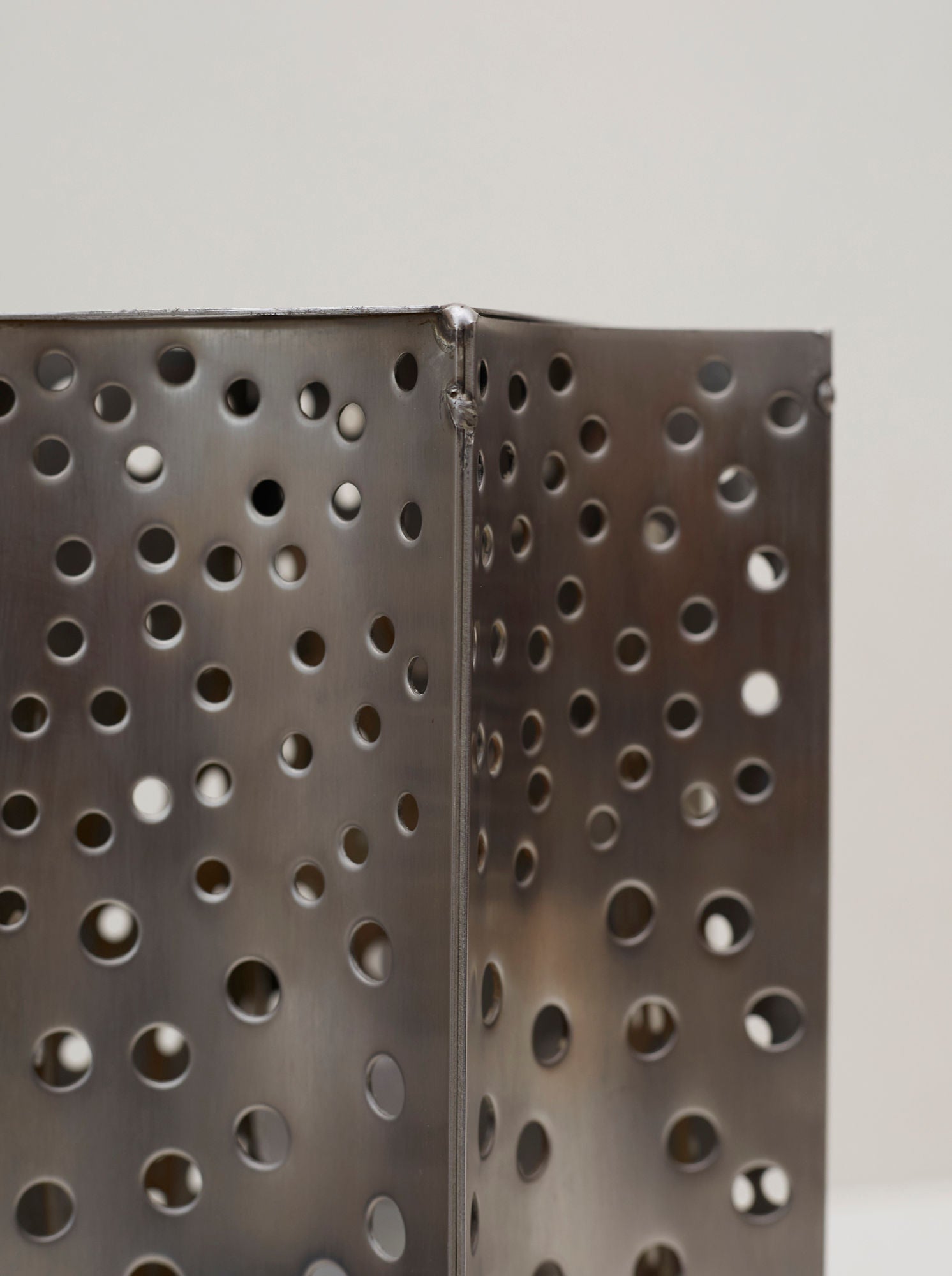 One of a Kind French Artisanal Stainless Steel Table Lamp Vintage Circa 1970 — close-up of perforated stainless steel texture