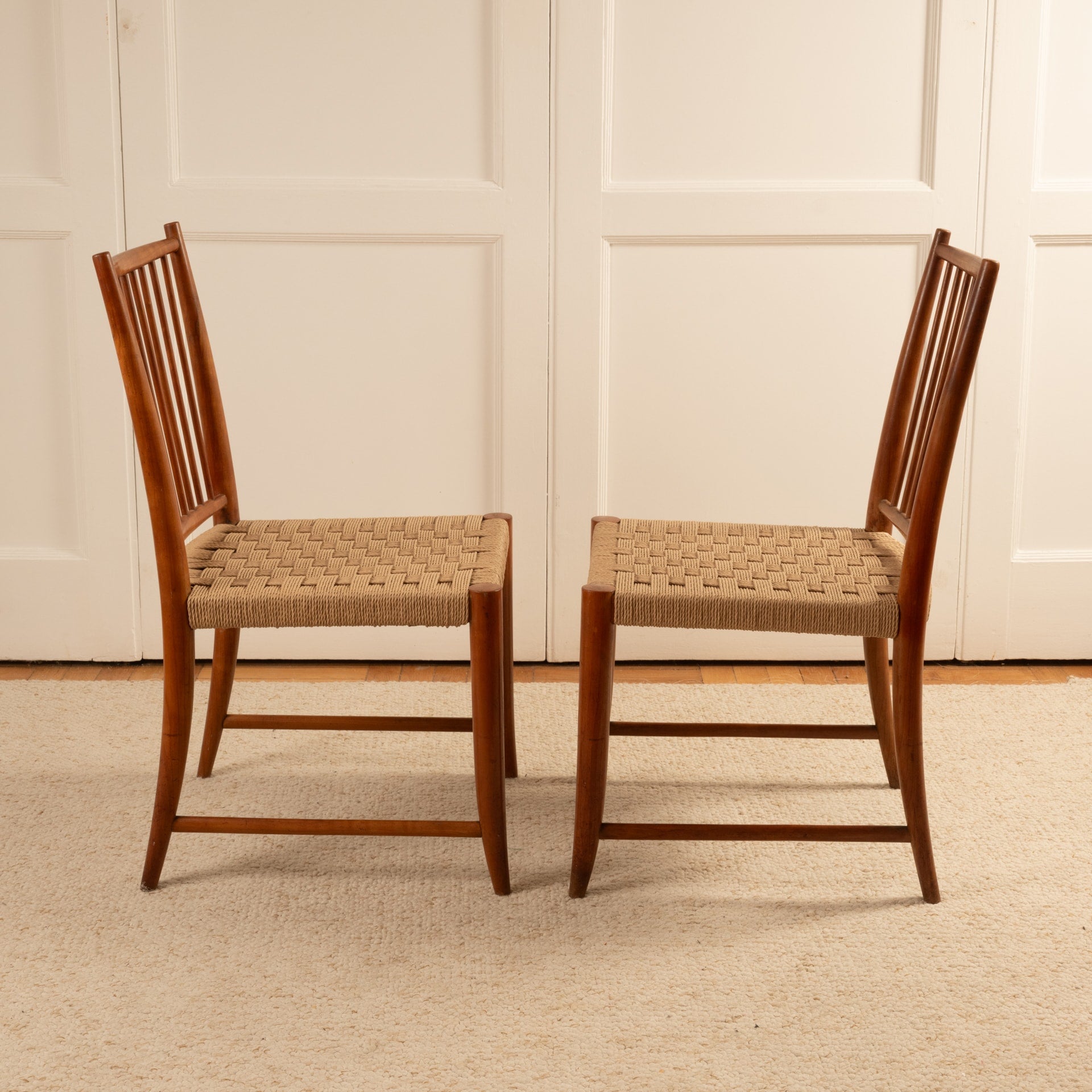 Two mid-century Paolo Buffa chairs with woven seats and slatted backs