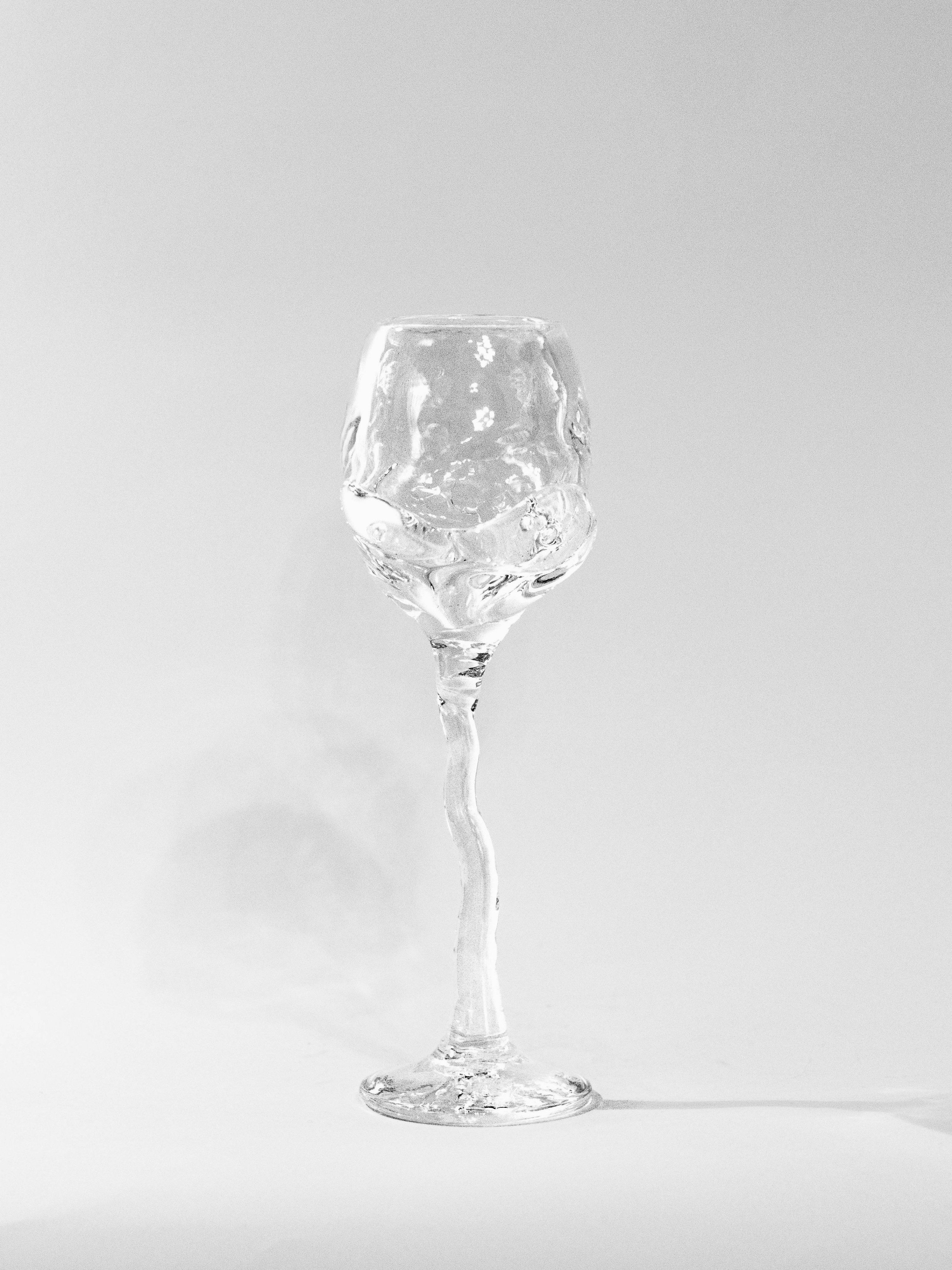 Hand-blown Wine Glass — close-up of textured clear glass surface