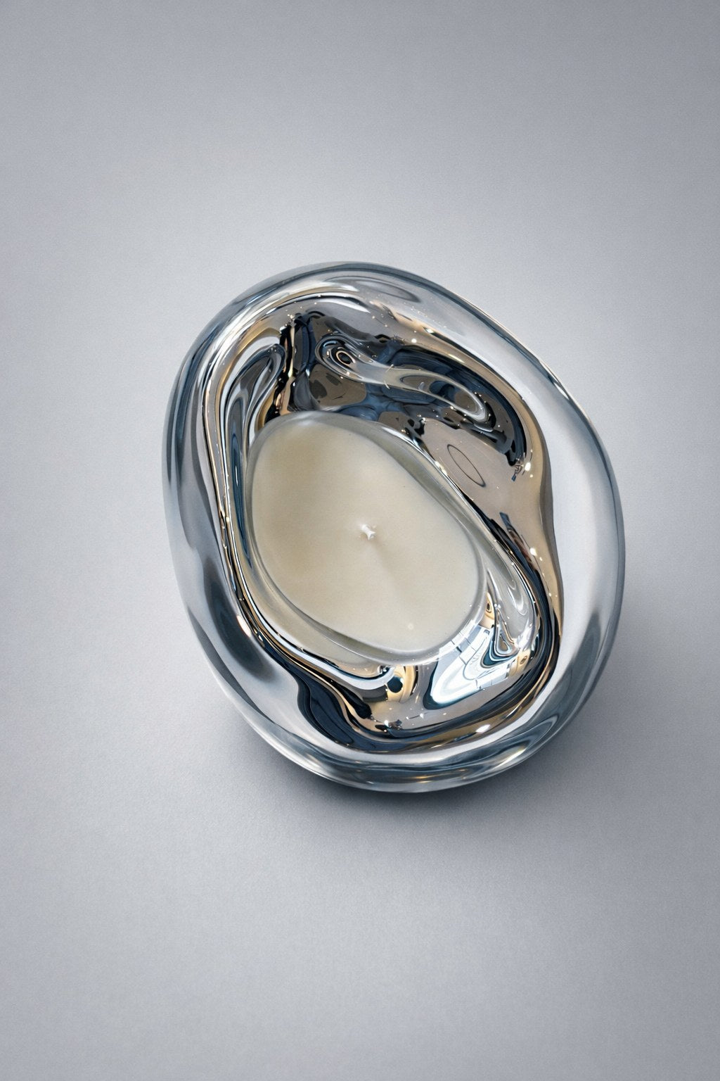 Lumi Candles — top view of clear glass candle holder