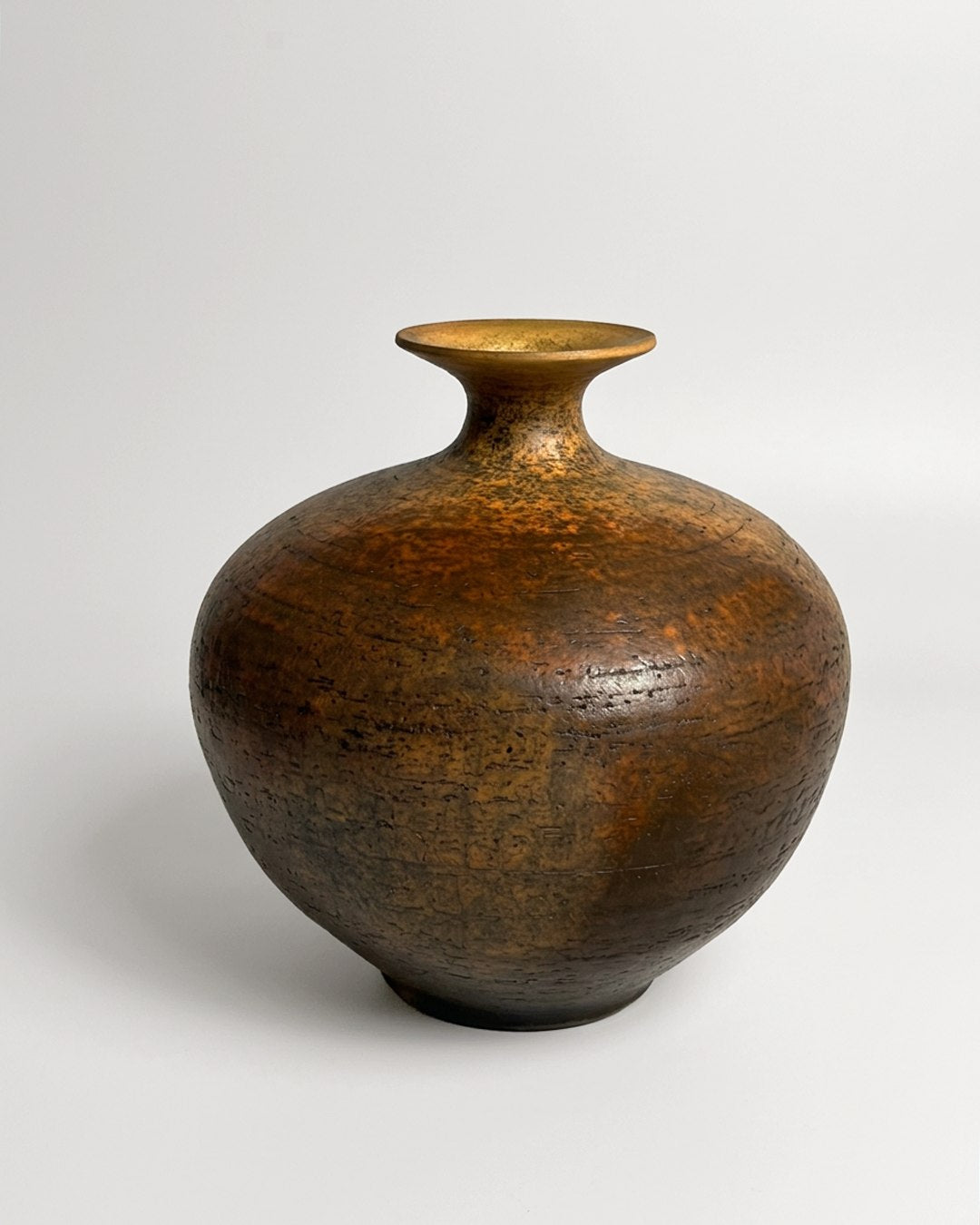 Lipari Vase – Terra sigillata, smoke-fired raku — lifestyle setting