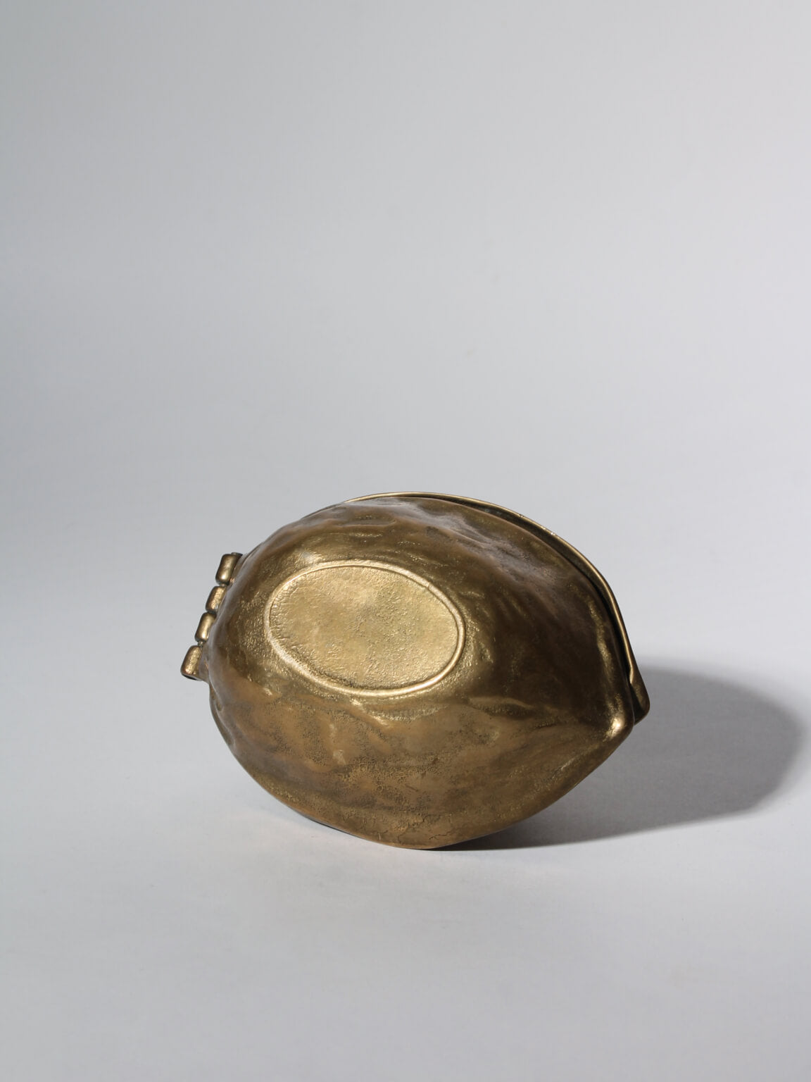 Vintage Brass Nutcracker Walnut, 1960s — angled view highlighting brass texture