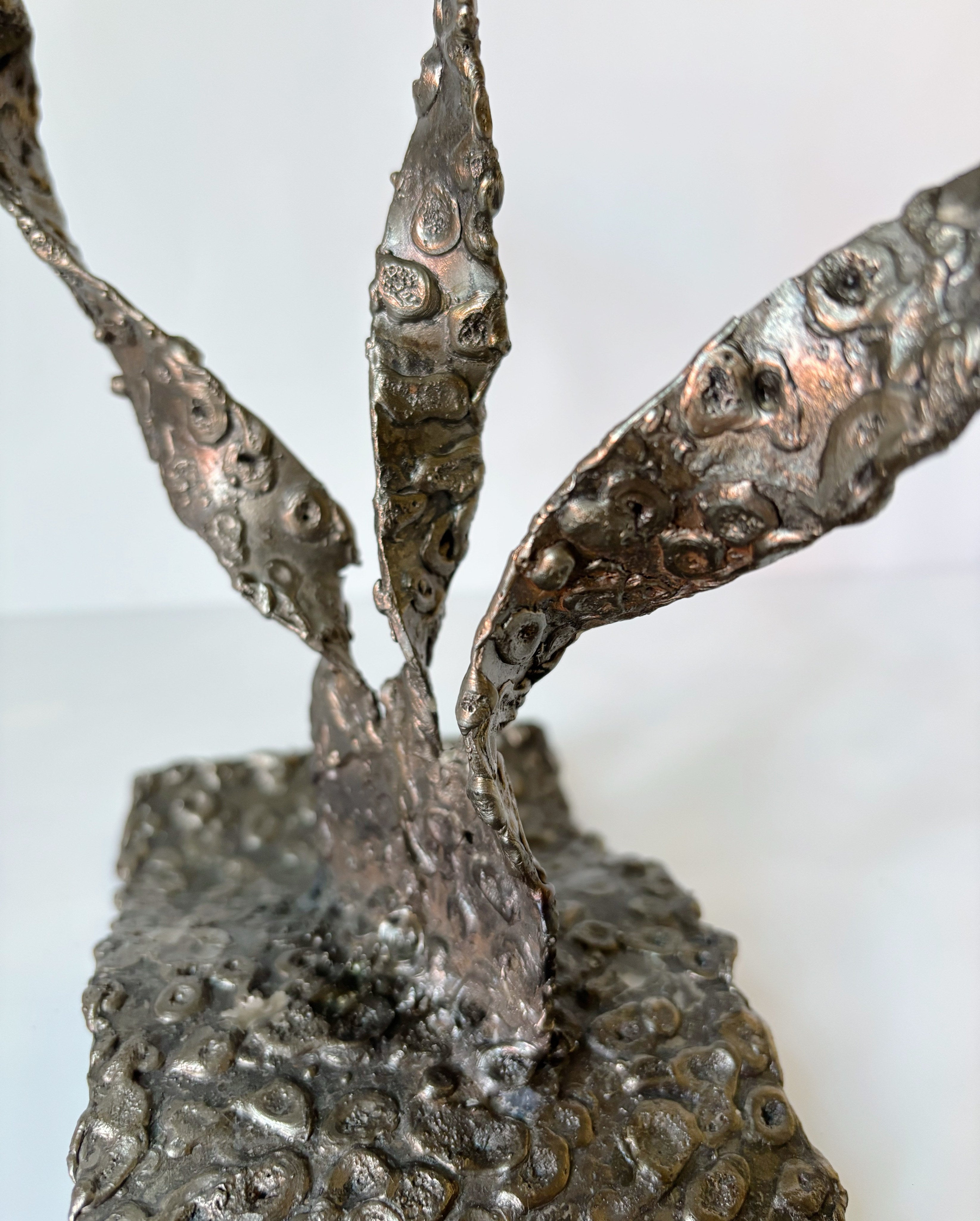 Molten Metal Sculptural 3 Arm Candlestick, Brutalist Poland — close-up of textured metal surface