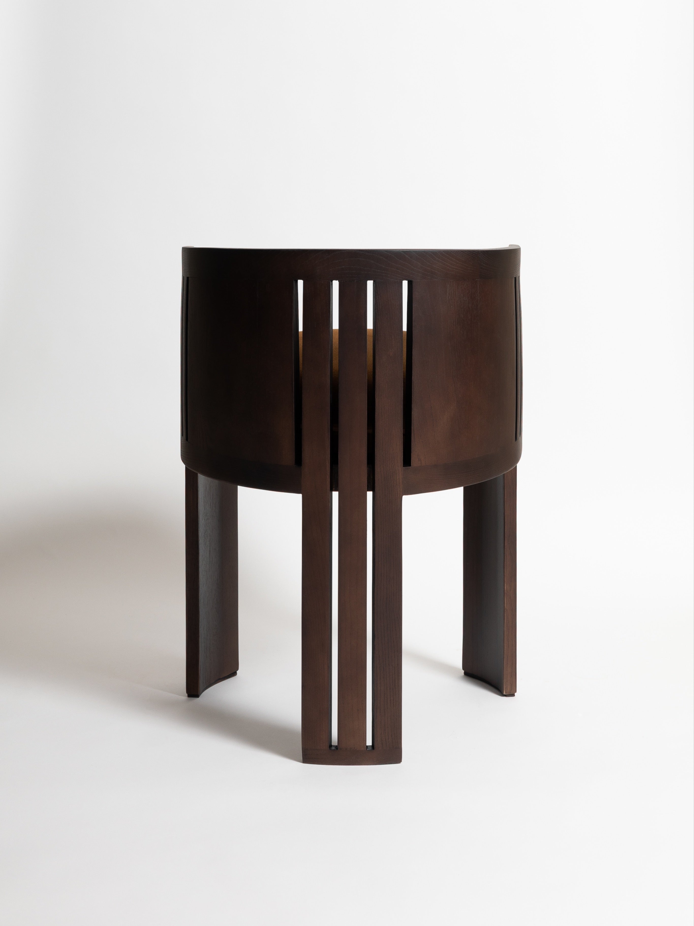 La Chaise 01 — top view of dark wood seat design