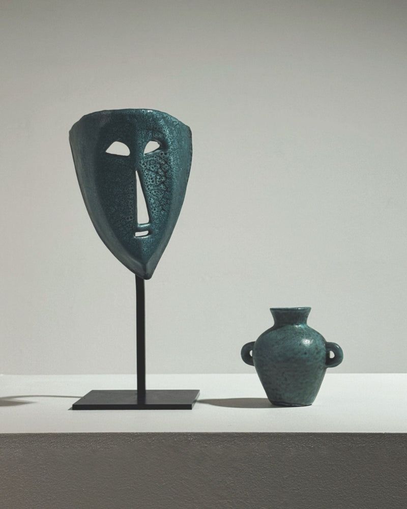 Tribal ceramic mask by Accolay Potters with matching vase sculpture