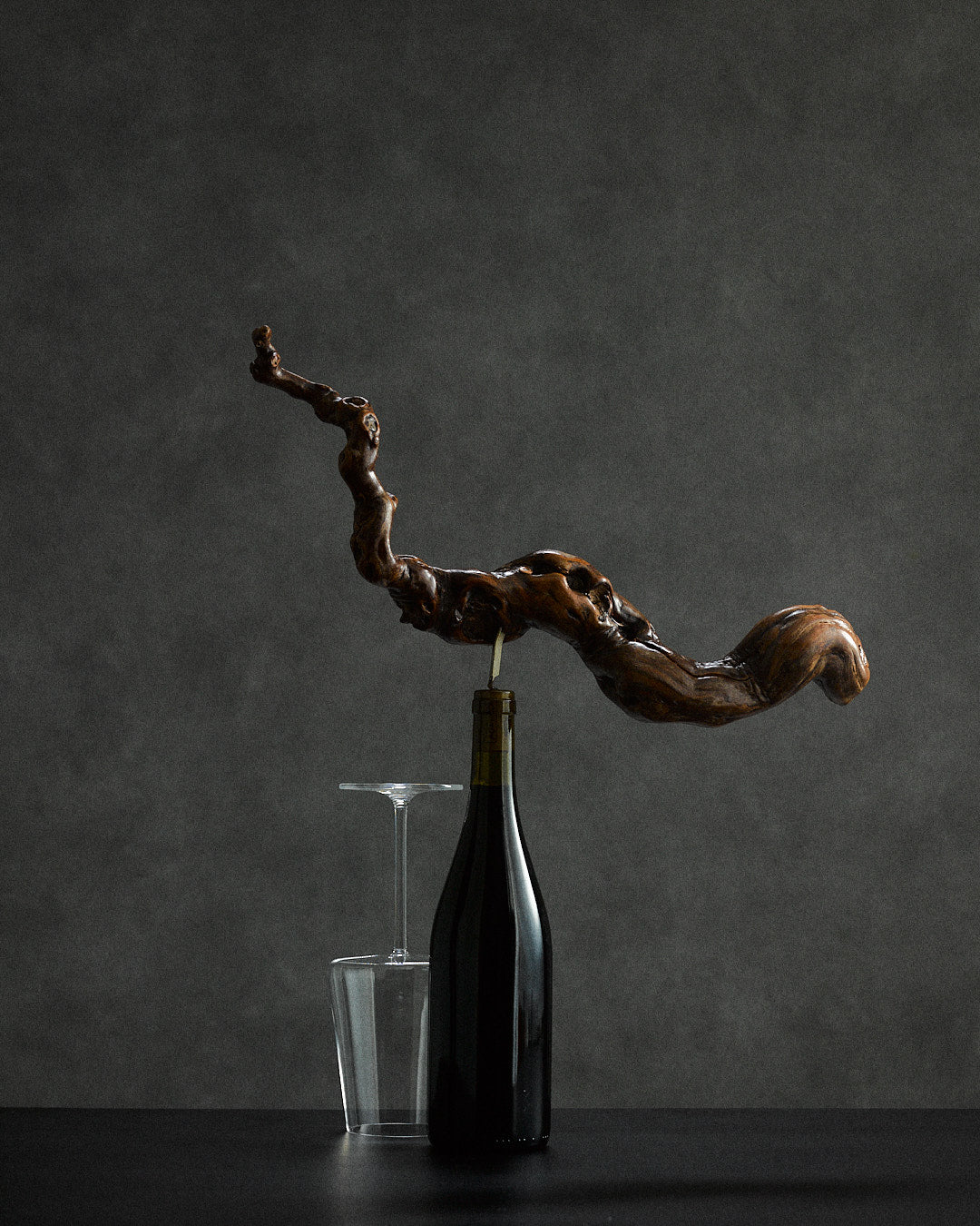 oversized vine root corkscrew — close-up of handcrafted wood detail