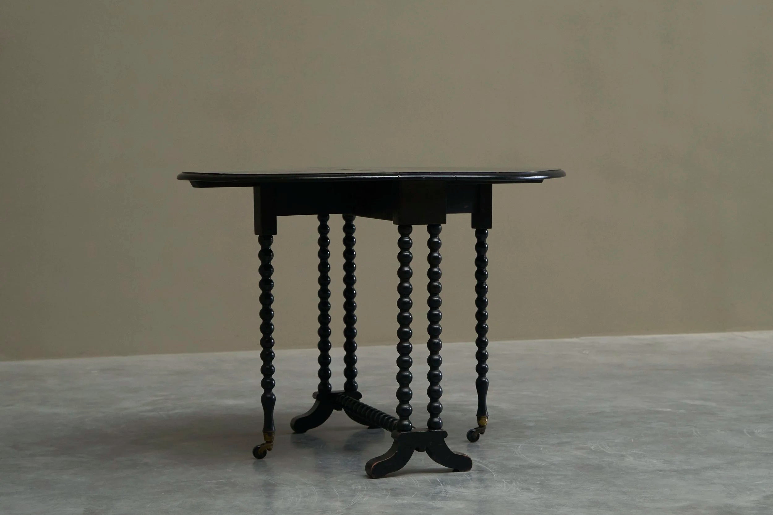 Beautiful Ebonized Bobbin Turned Baby Sutherland Table England Late 19th Century — close-up