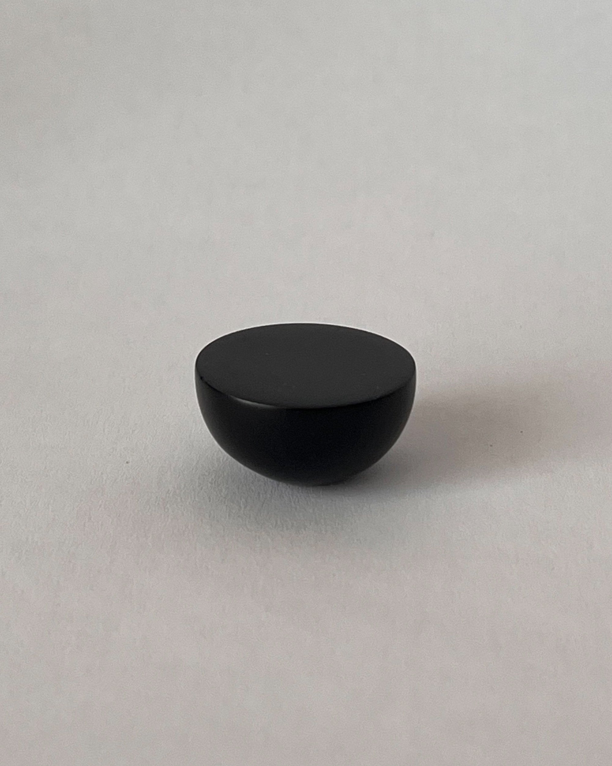 CERCLE Cabinet Knob Half — black ceramic knob on white background