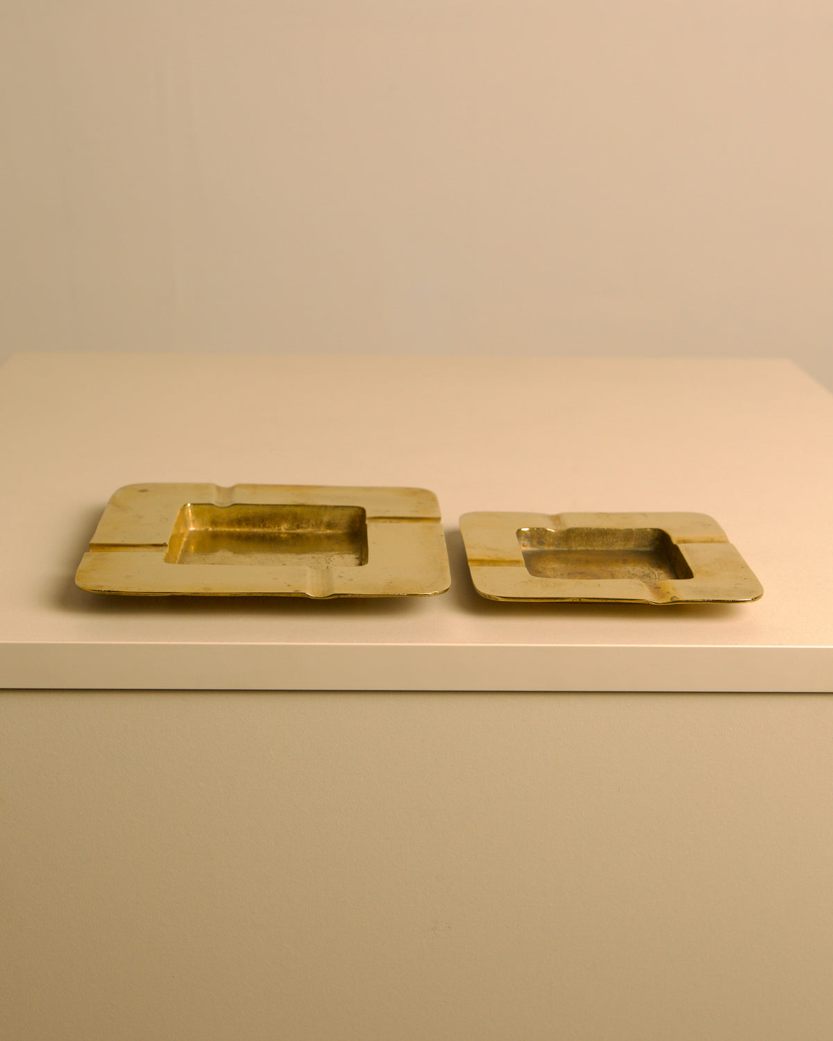 Pair of Italian hammered brass ashtrays, 1960s — lifestyle setting