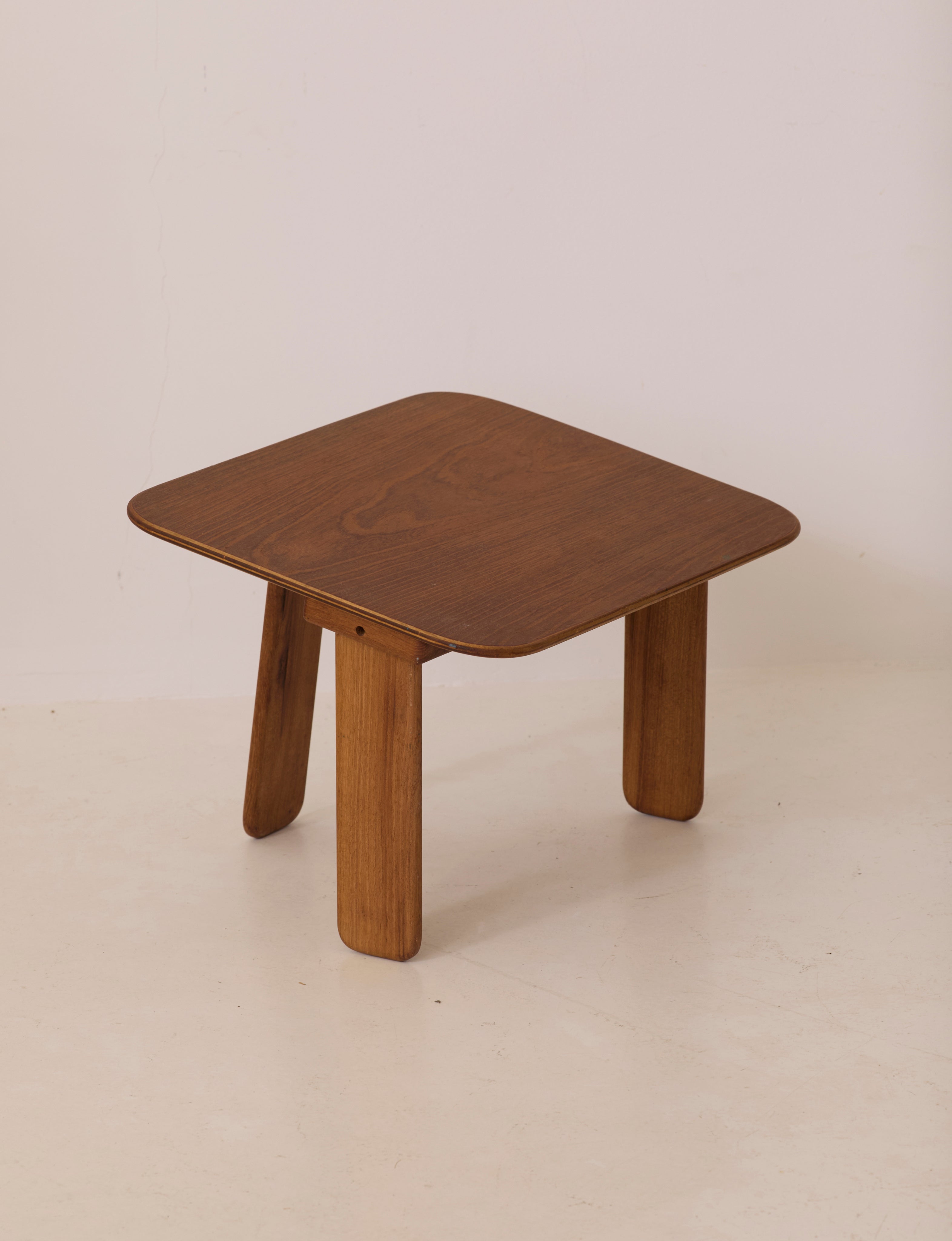 Small dismountable wooden meditation table by Alain Gaubert, France circa 1980 — side angle showing warm wood finish and simp
