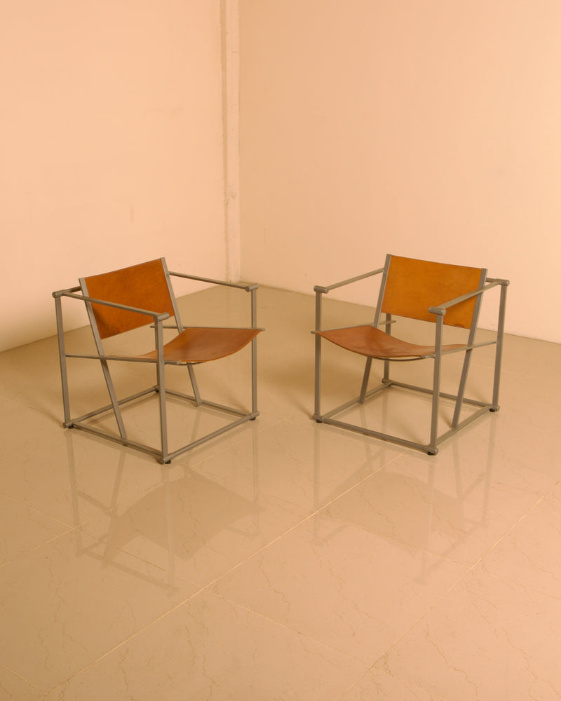 Pair of "FM62" Armchairs by Radboud van Beekum for Pastoe, 1980s — close-up of leather seat and metal frame