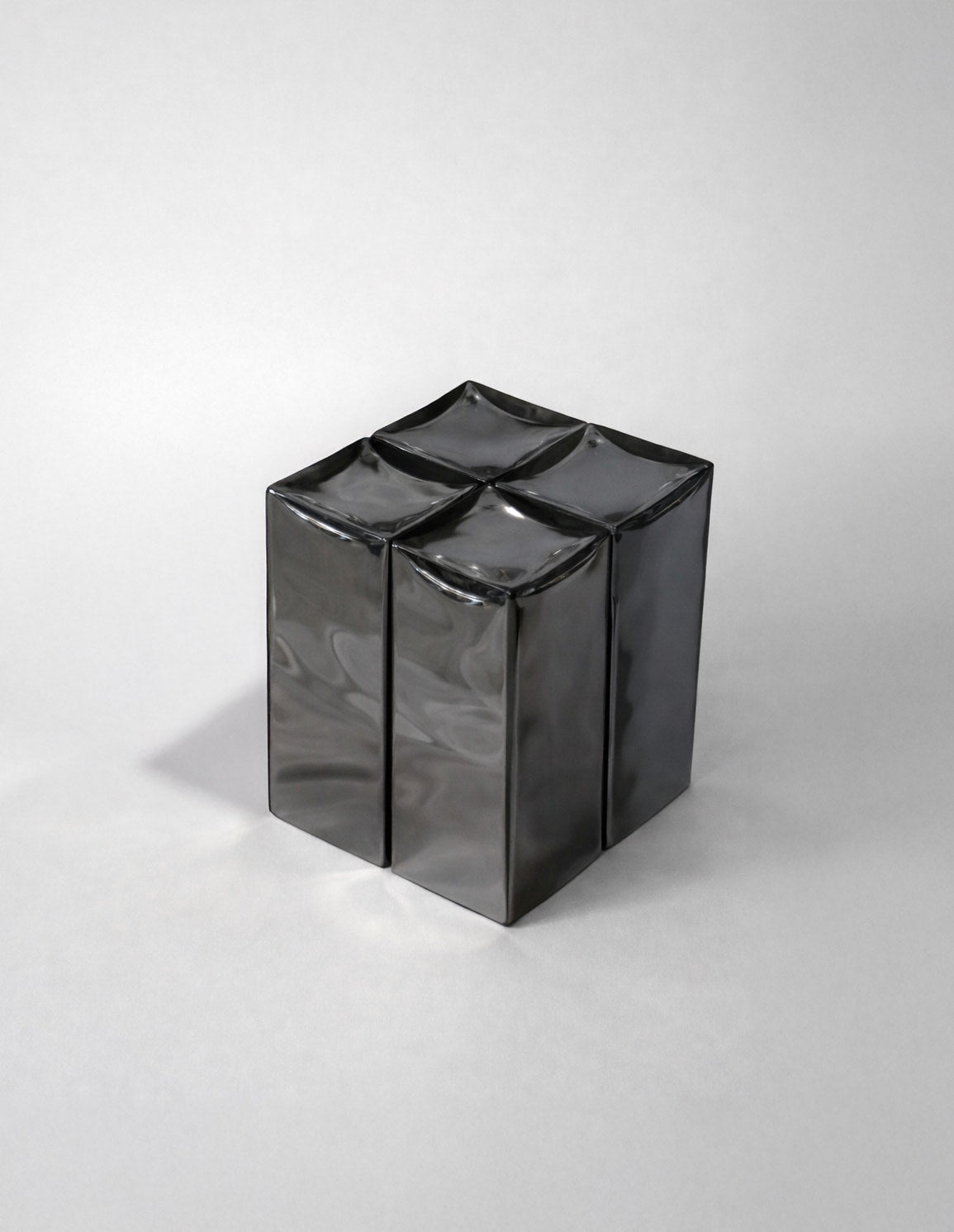 MONOLIT' Stool / Side Table — close-up of glossy black ceramic finish