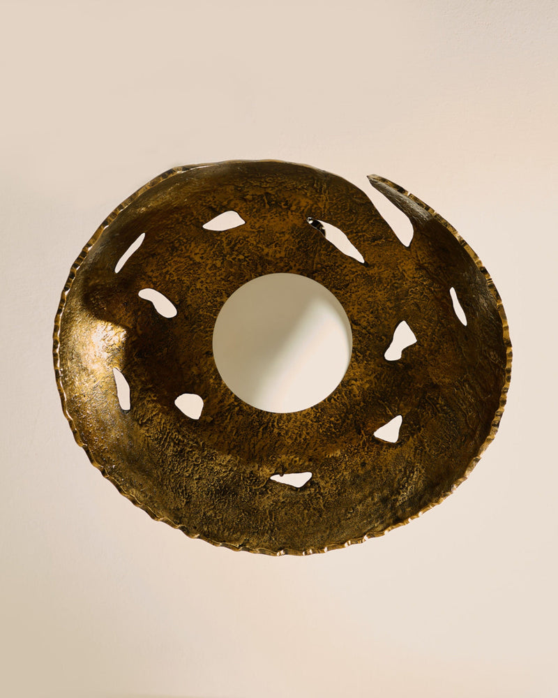 Harvest Moon — top view of textured bronze sculpture