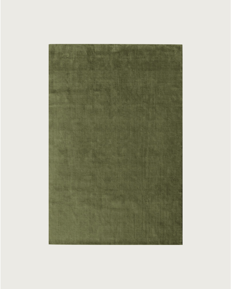 Rug 100% Wool New Zealand - Mousse — close-up of soft green fabric texture