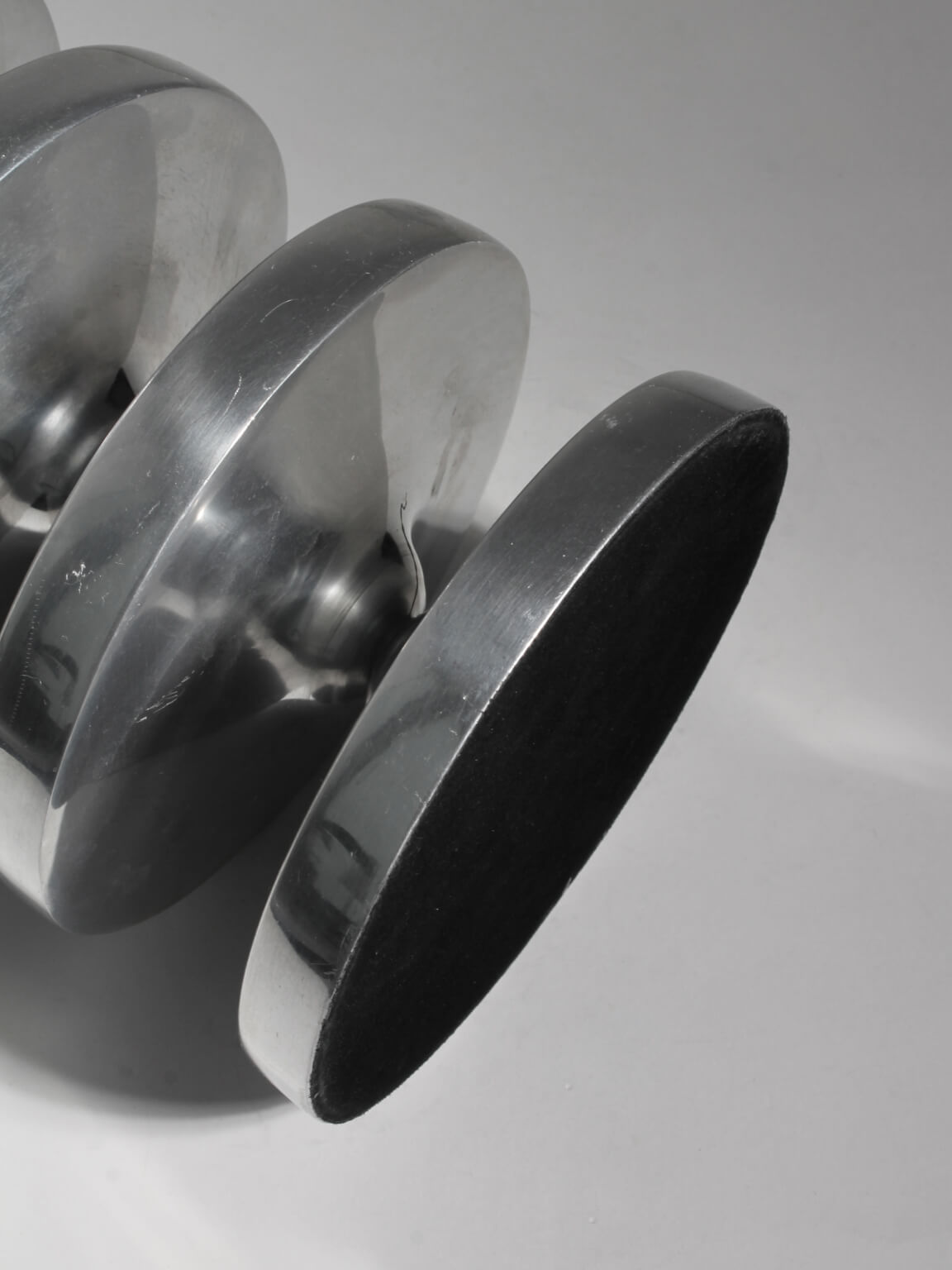 Pair Of Aluminum Contemporary Rimmed Stands — close-up