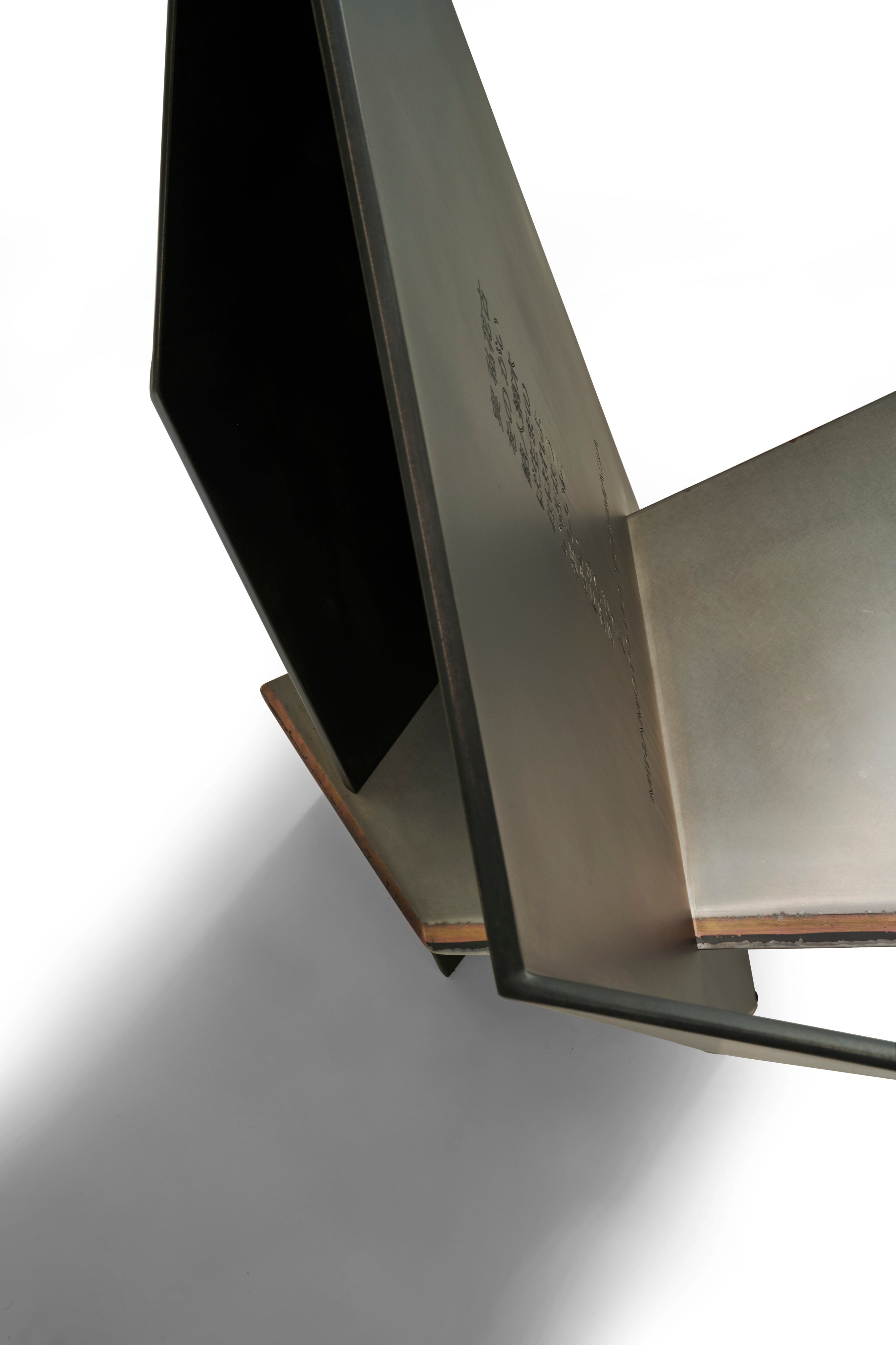 HARAKIRI Conceptual Chair in Metal and Steel — angled view highlighting metal structure
