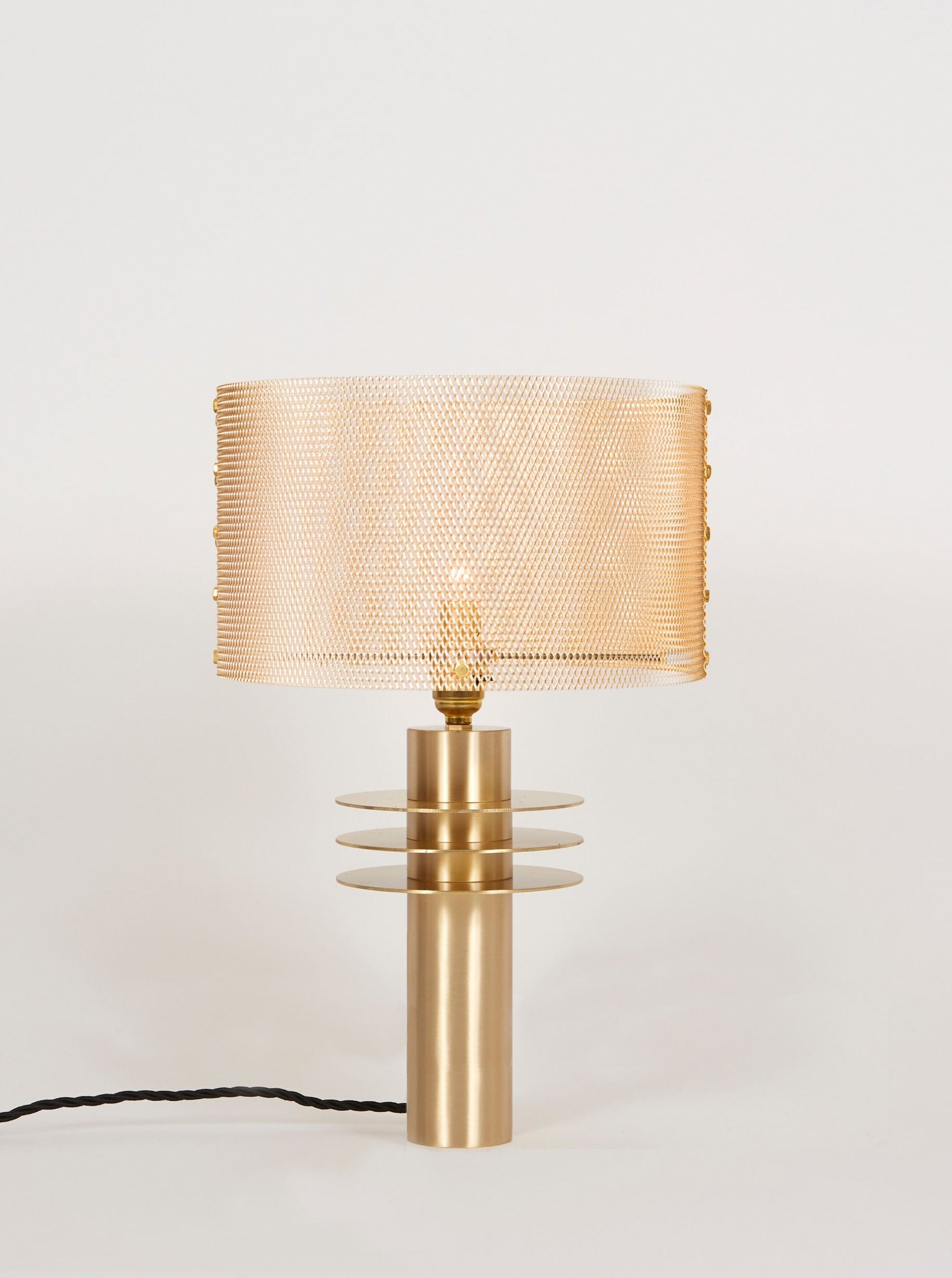 Black Swan Table Lamp — close-up of brass mesh shade