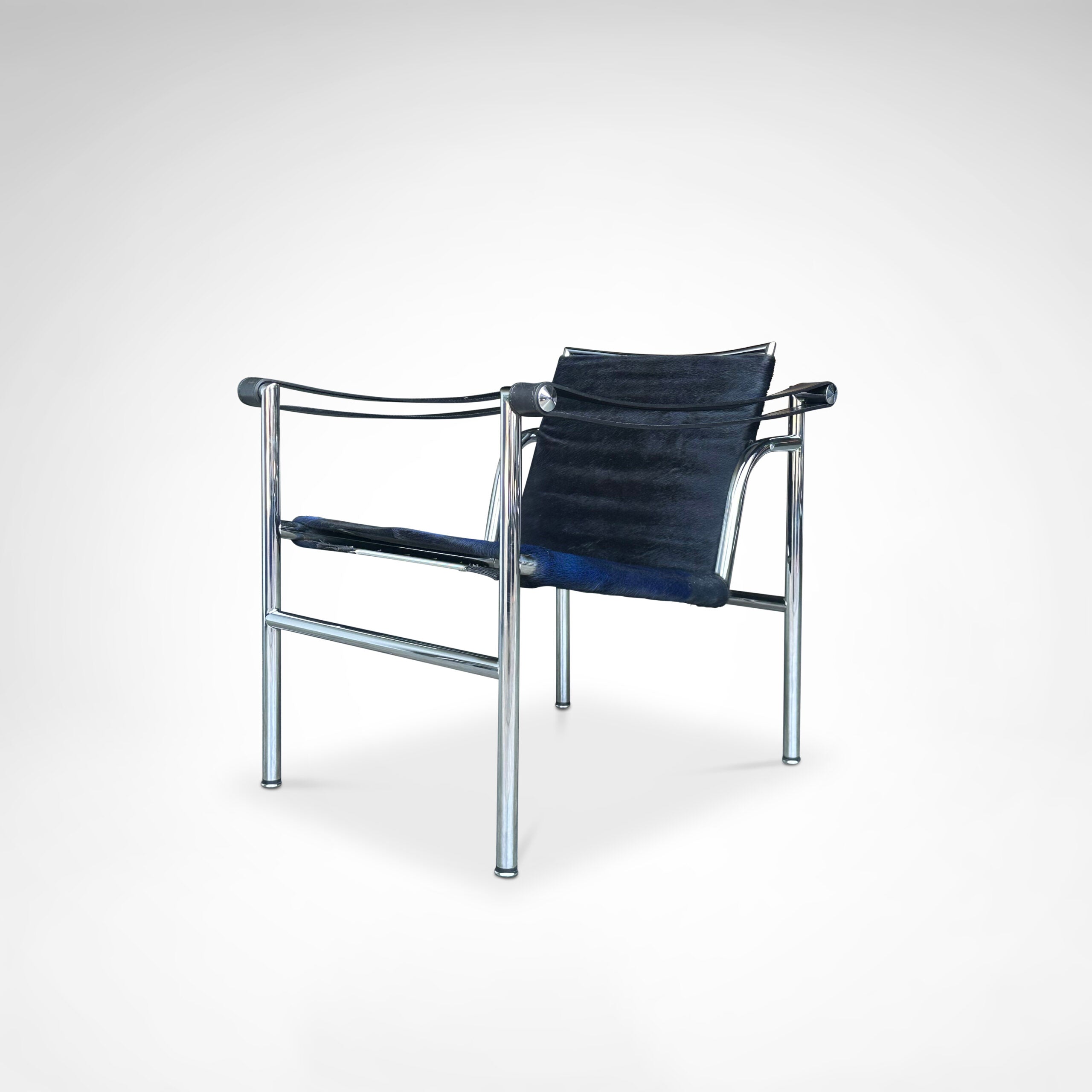 LC1 Blue and Black Ponyskin Armchair by Le Corbusier, Charlotte Perriand & Pierre Jeanneret for Cassina, 1990s — lifestyle setting