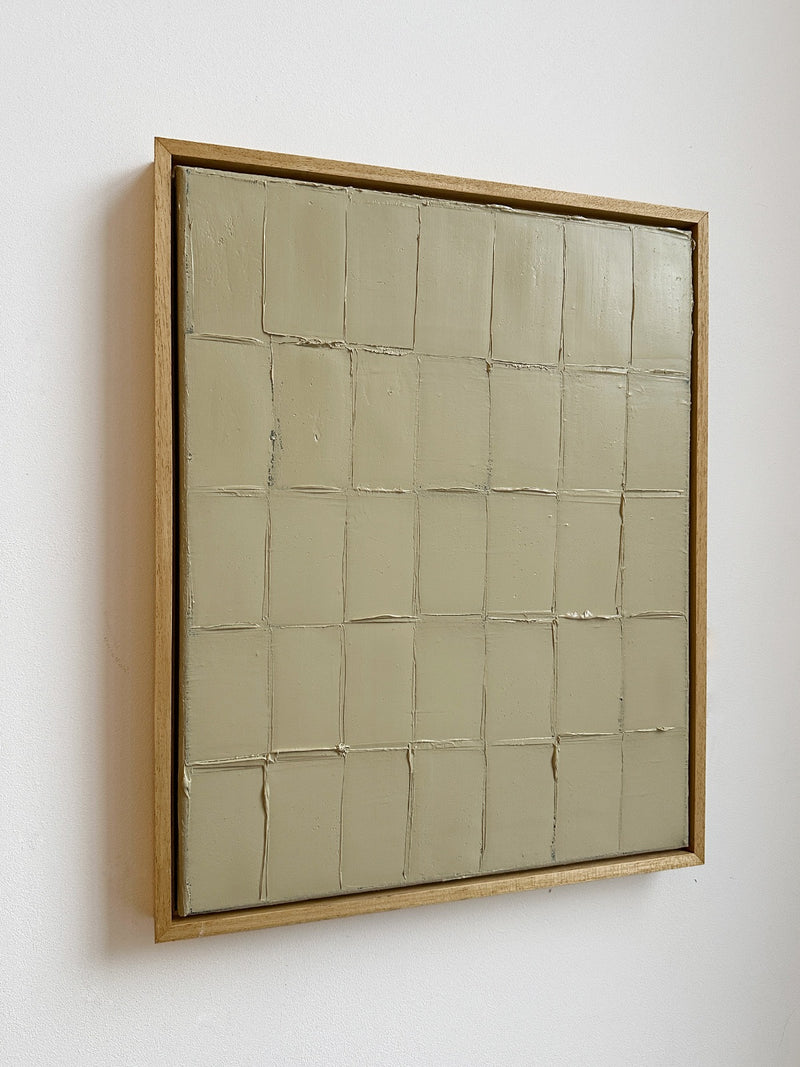 Buff Titanium - Strokes' Painting — close-up of textured beige surface in wooden frame