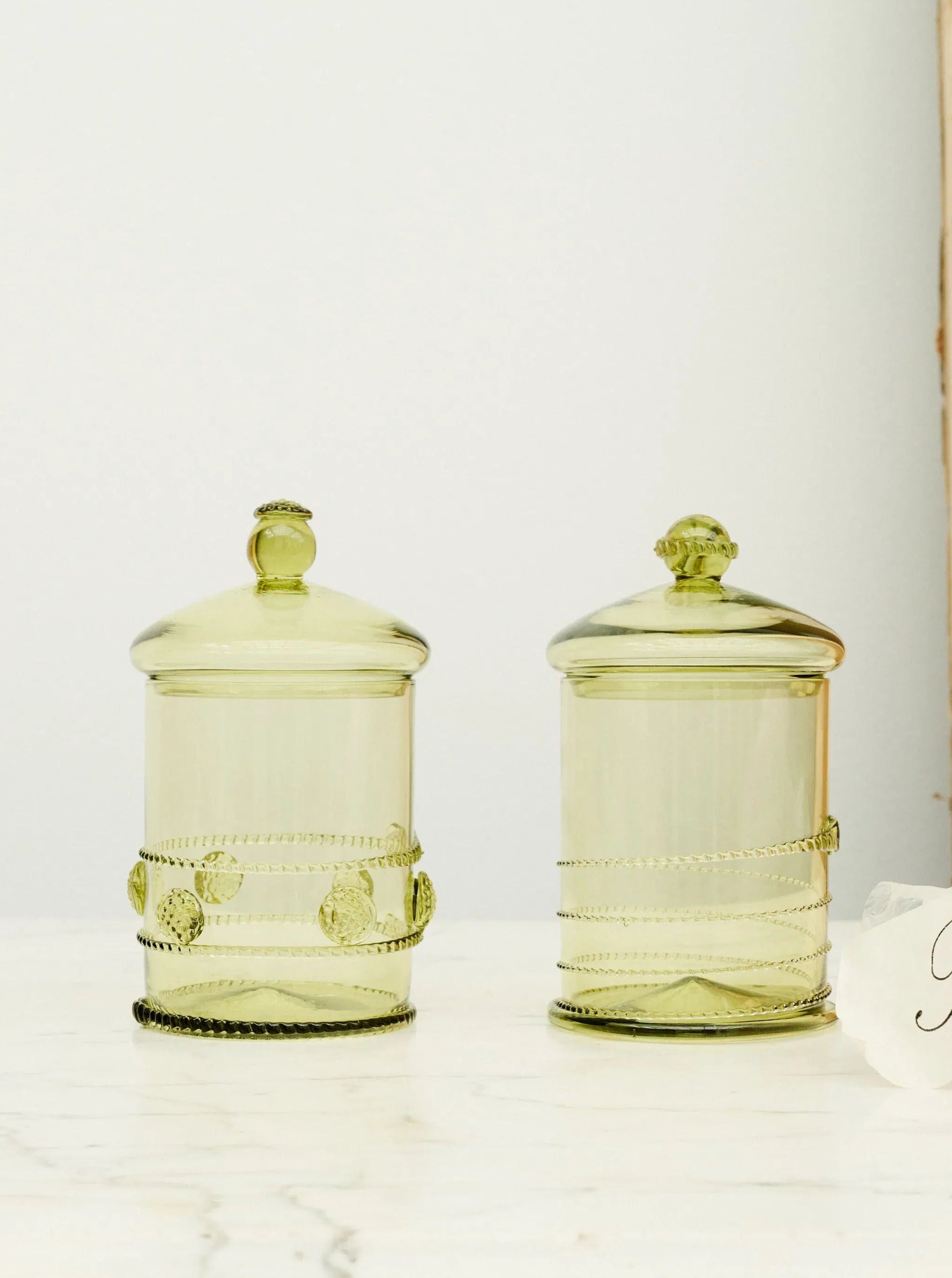 Karl Bonbonnière Swirl — green glass jars on marble surface