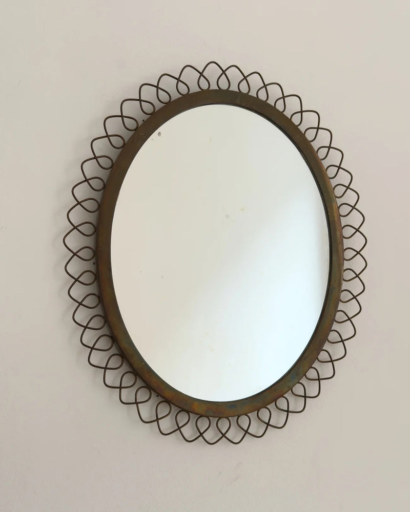Sculptural Brass Mirror by Galerie Storm | The Oblist — handcrafted brass frame