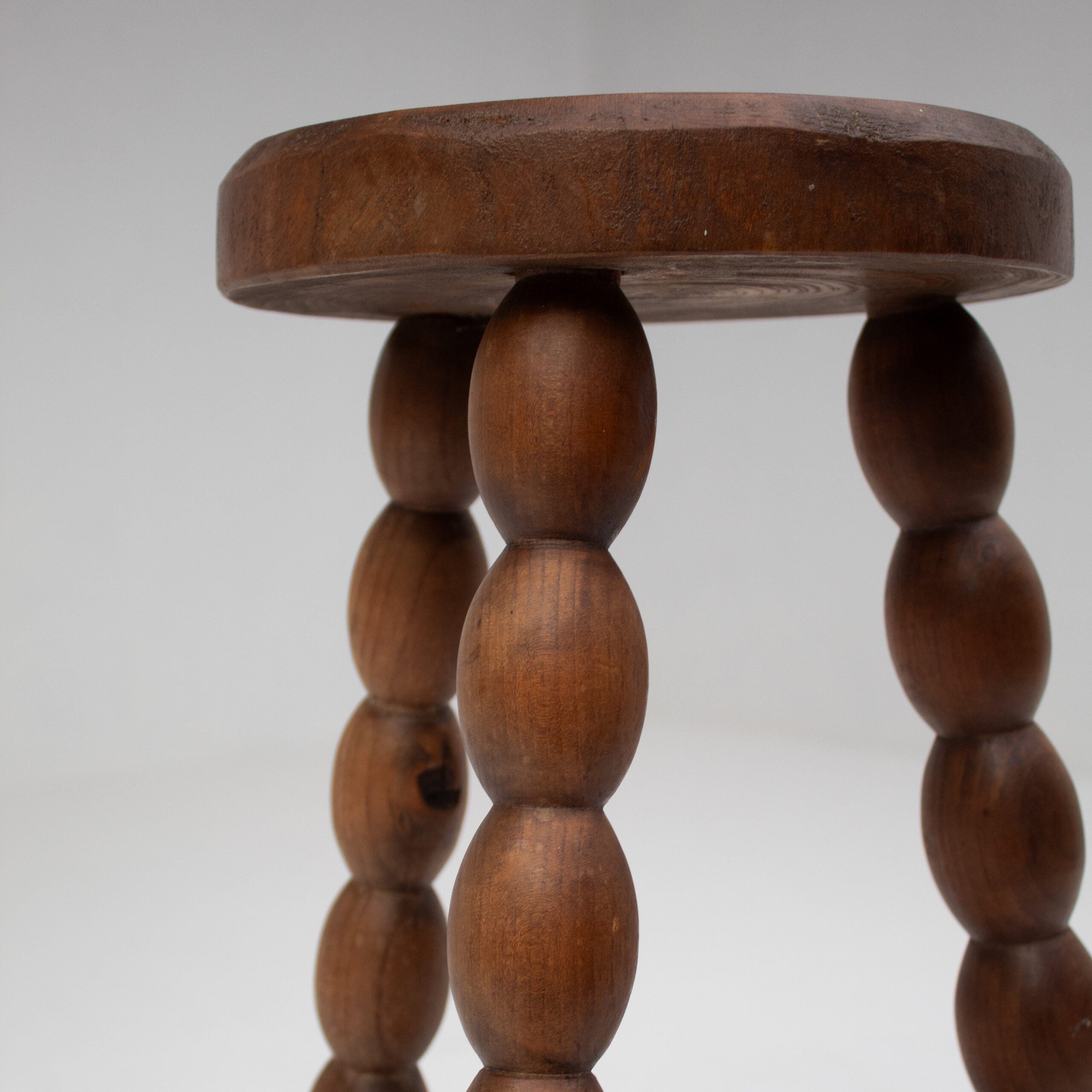 Bobbin Stool in Solid Walnut Wood — close-up