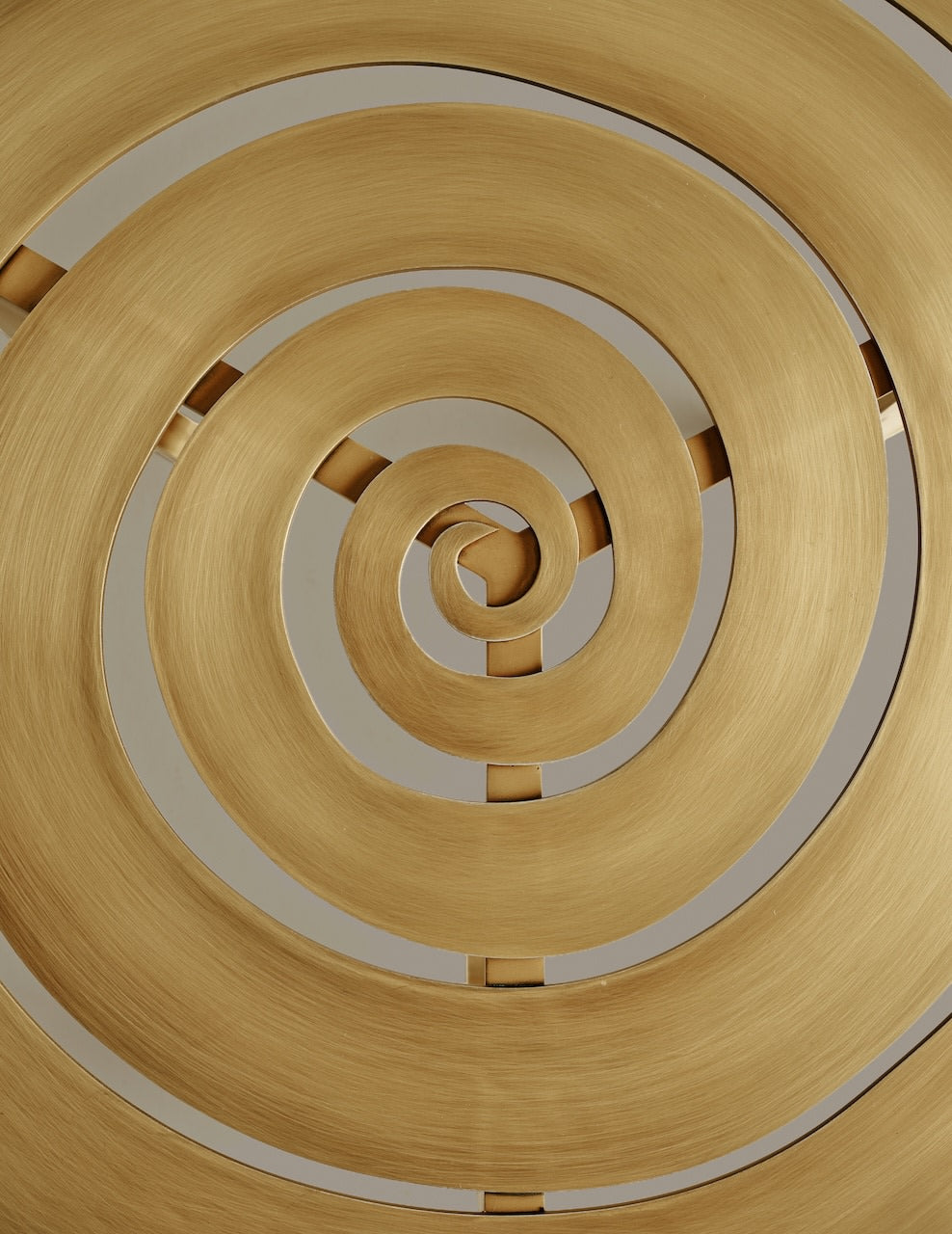 Colette Table — close-up of spiral brass design