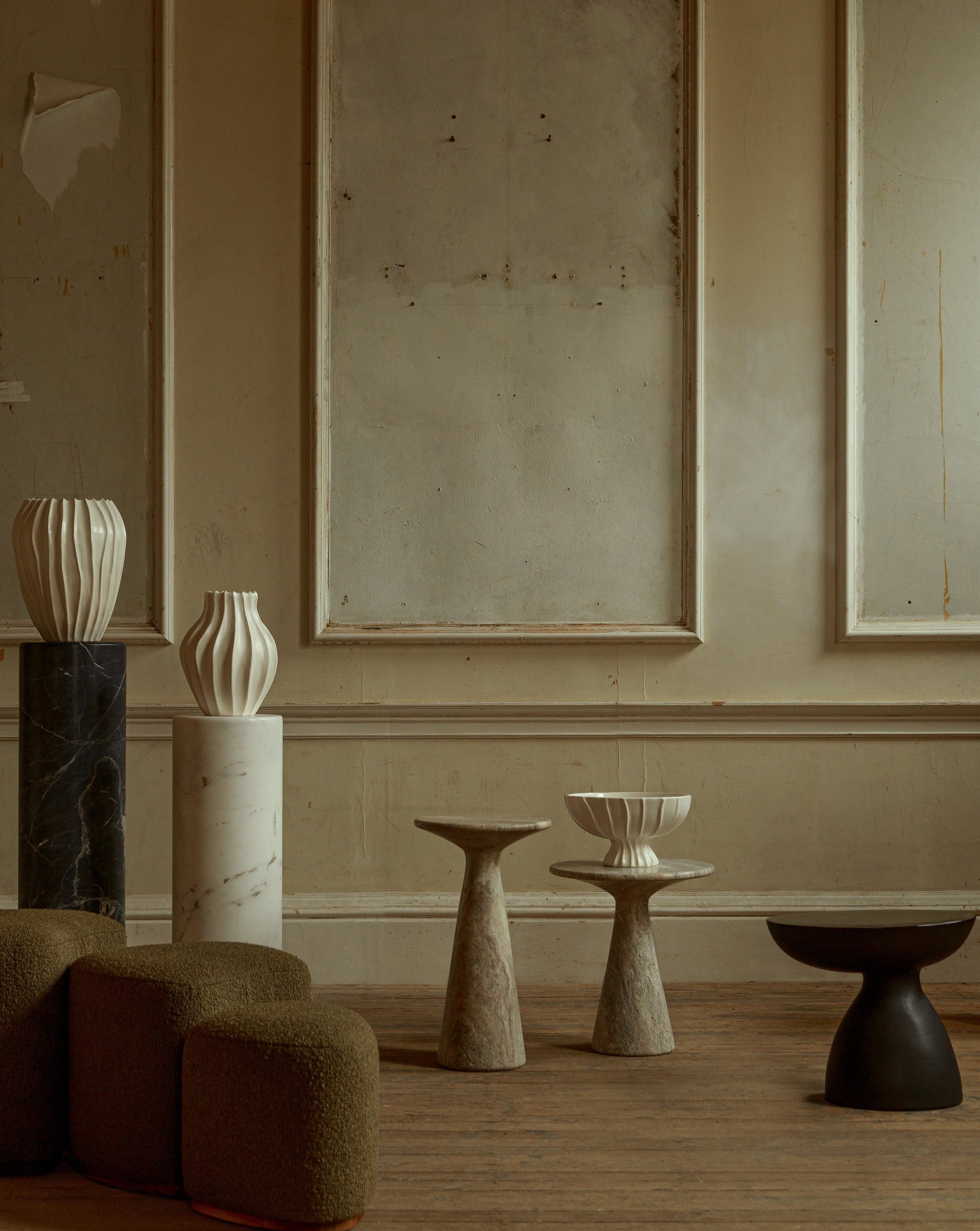 Juno Medium Travertine Side Table — close-up