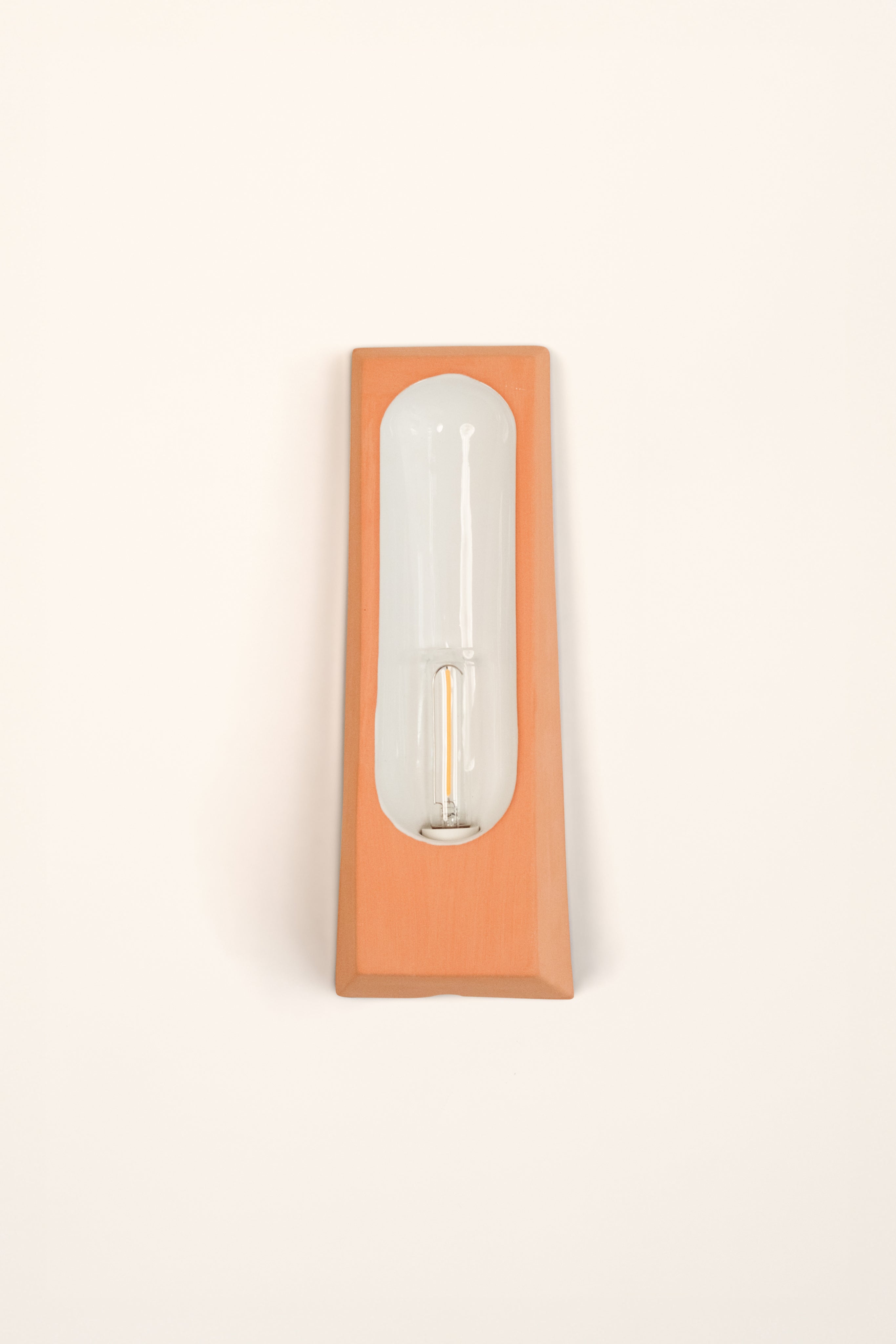 Alcove Terra B Mat — side angle showing terracotta base and glass bulb