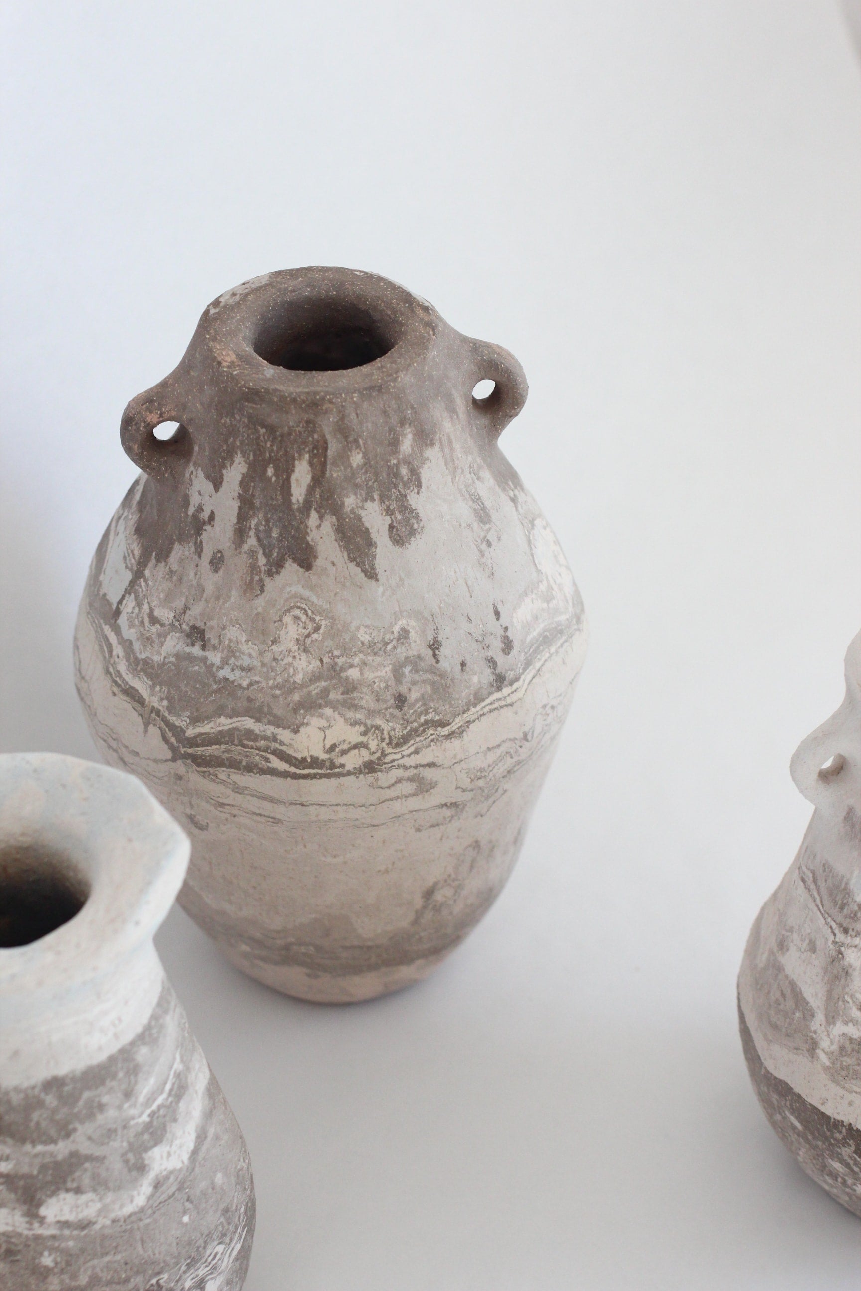 Ceramic Vase Cos 06 — side angle showing textured ceramic surface