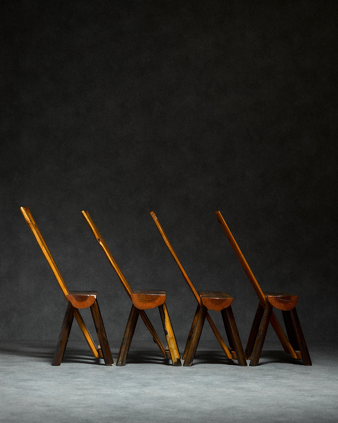 Set of 4 Folk-art Pine Chairs from the Italian Alps — angled view showing handcrafted wooden structure