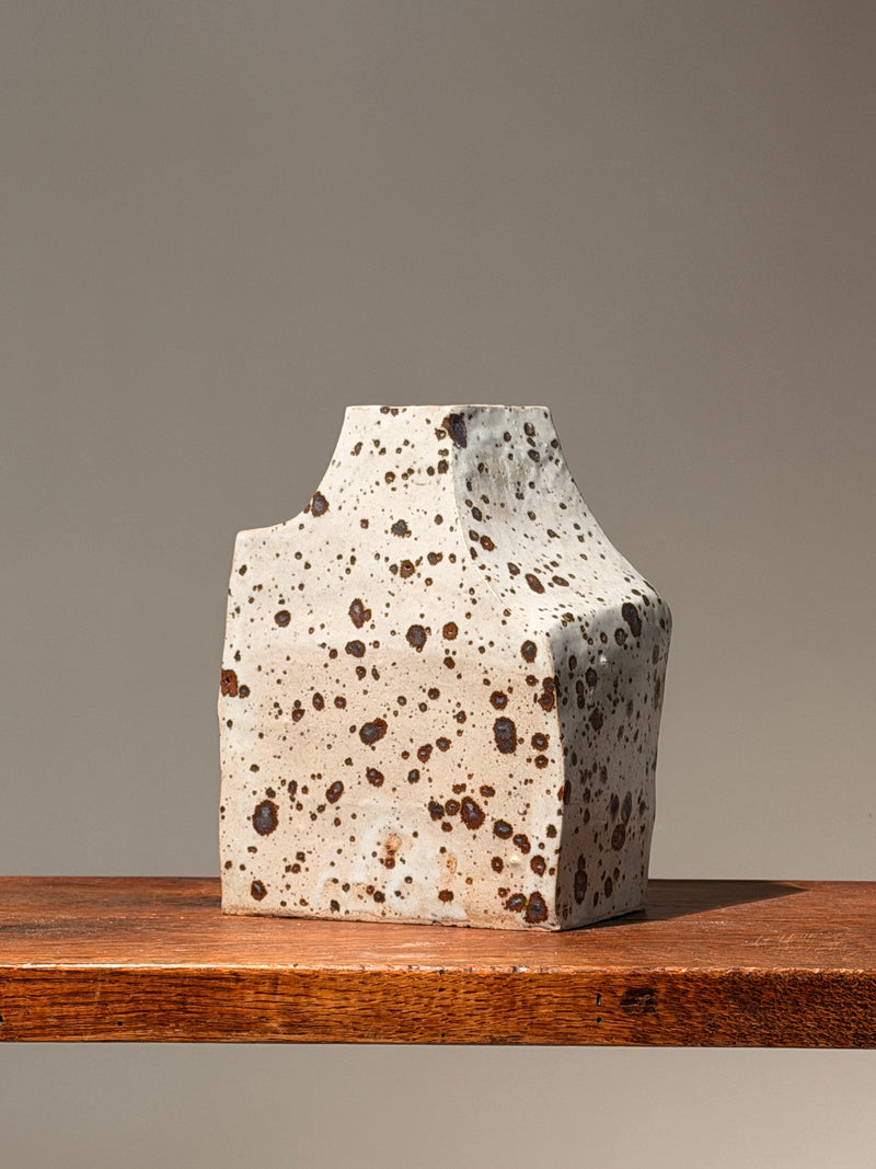 Geometric stoneware vase with pyrite glaze, France, circa 1960. — lifestyle setting