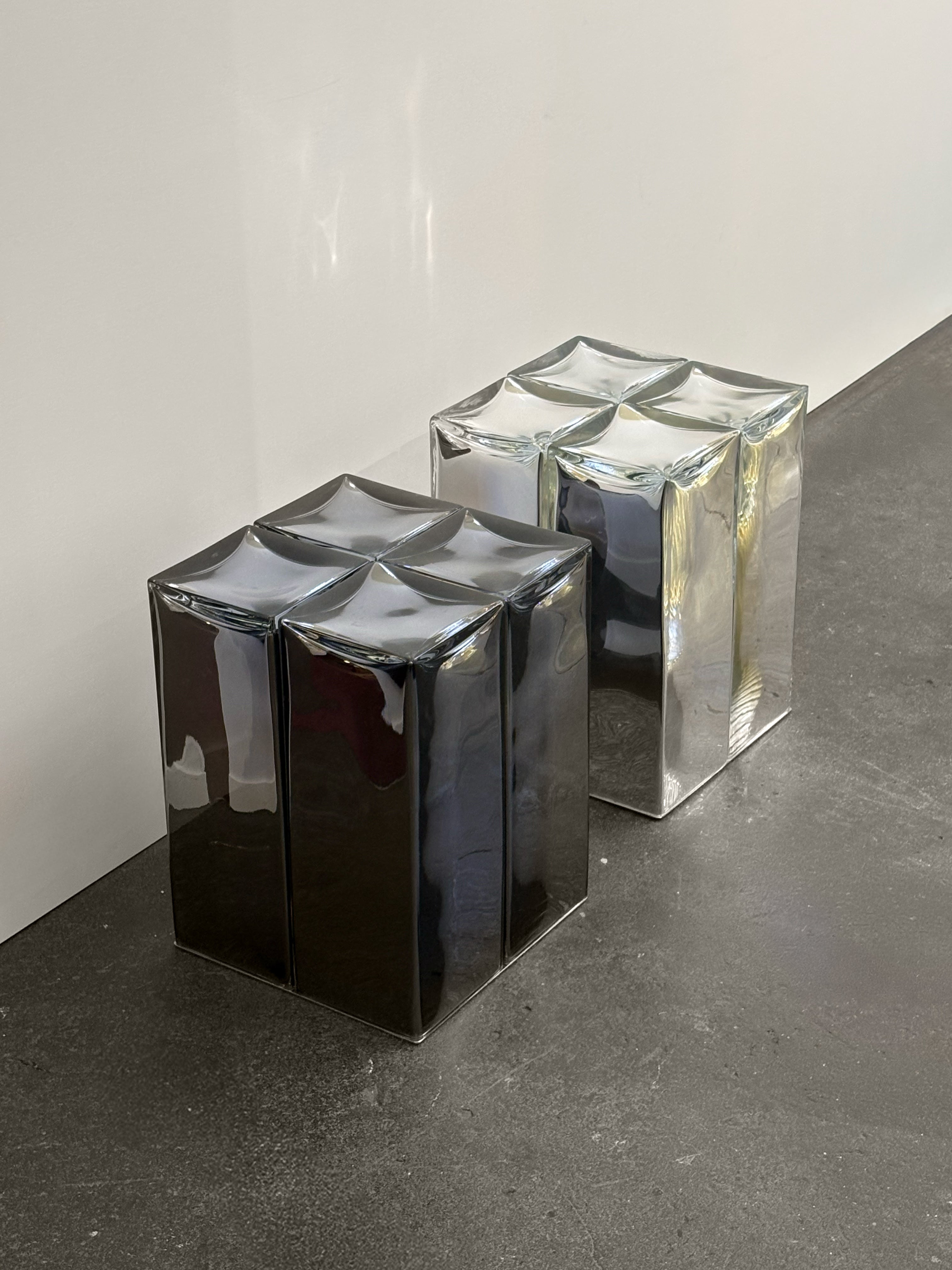 MONOLIT' Stool / Side Table — top view of reflective acrylic surface