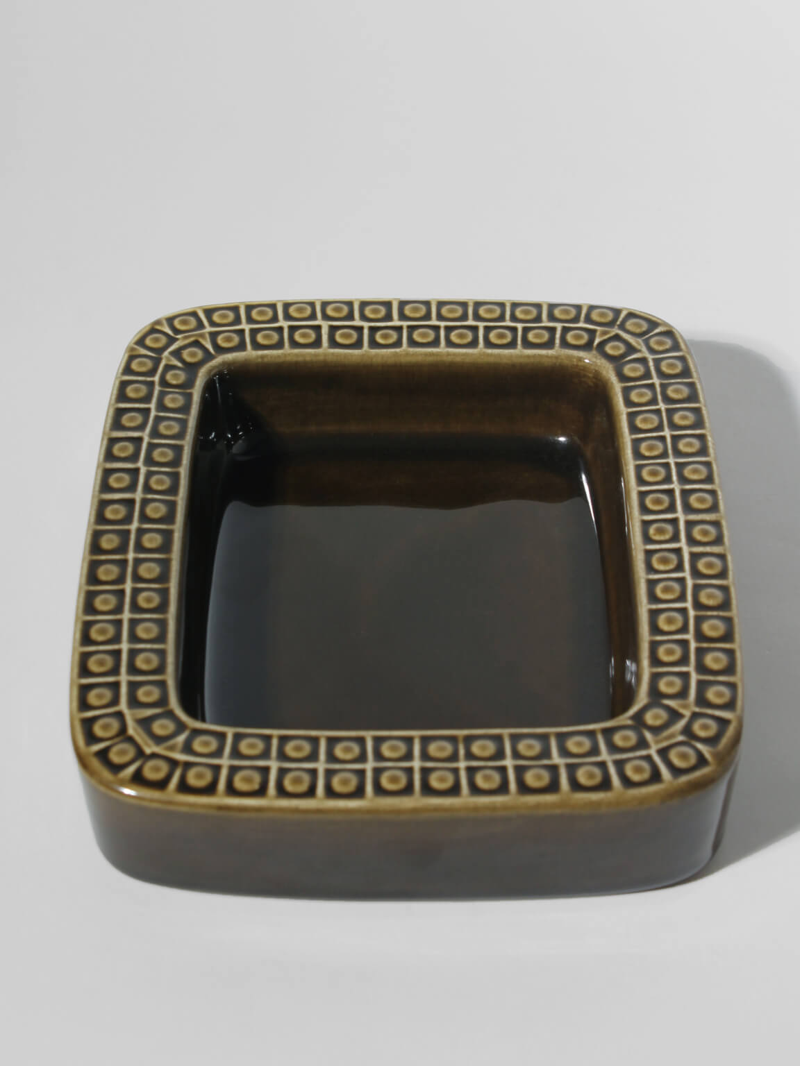Gunnar Nylund Ceramic Glazed "Kub" Bowl, For Rörstrand, 1960s, Sweden — top view of dark ceramic with patterned rim