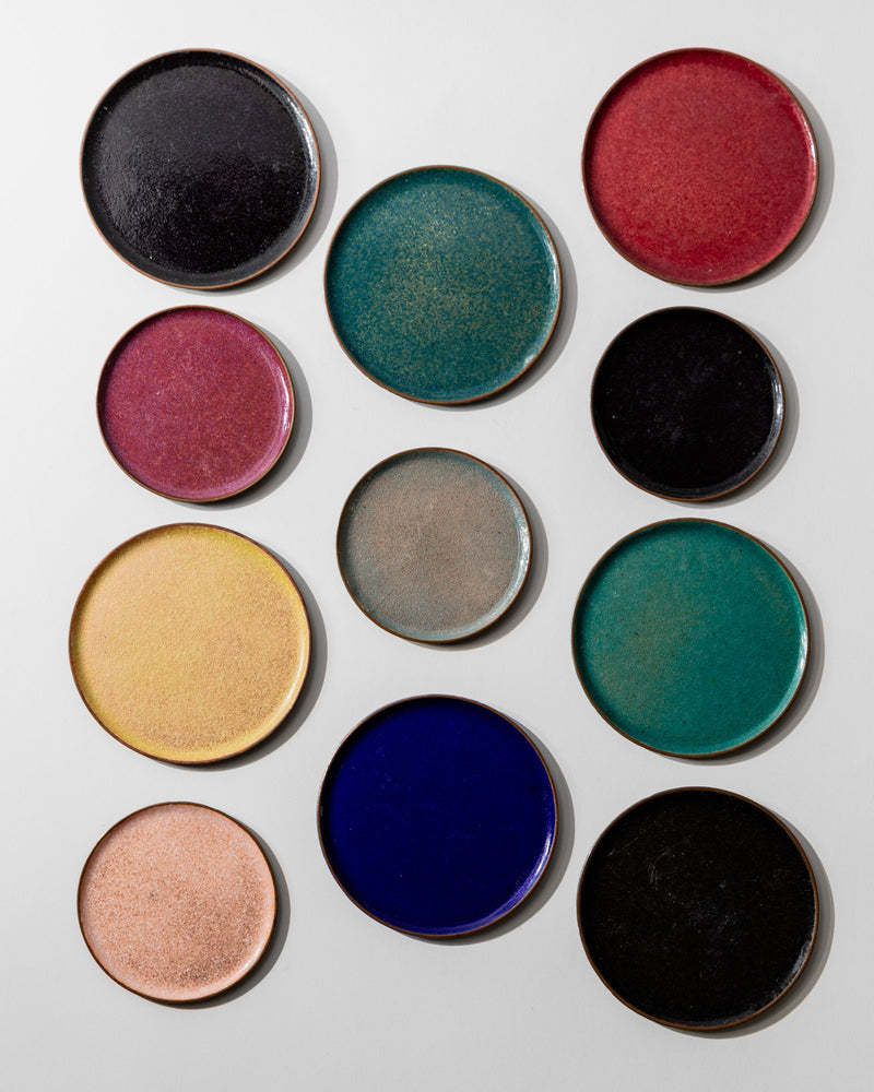 Vintage 1960s Enamel Coasters Set of 11, Small and Large, Copper with Colorful Enamel — close-up of colorful enamel surfaces