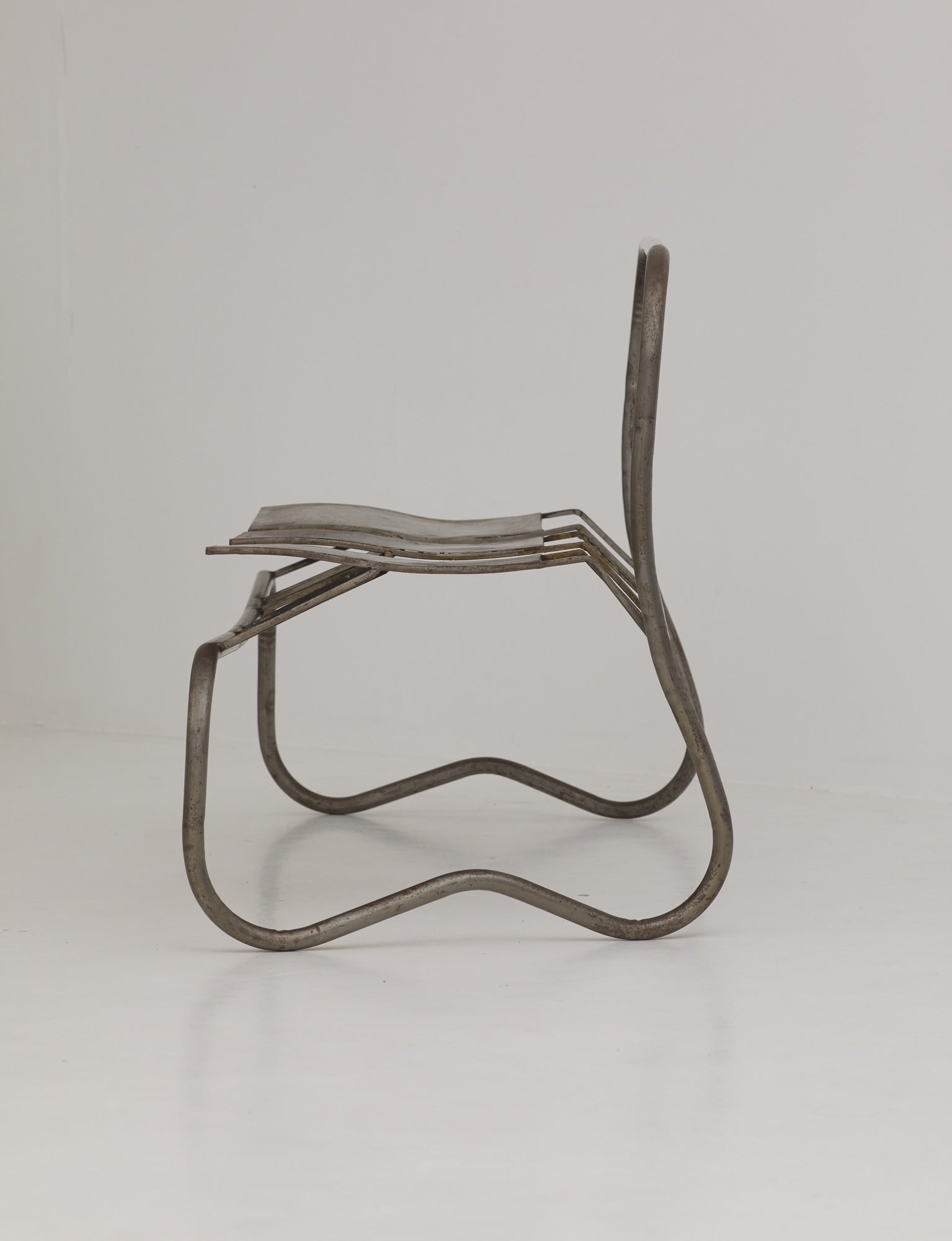 Unique Signed Artist Bench / Settee in Metal — side view showing metal frame design