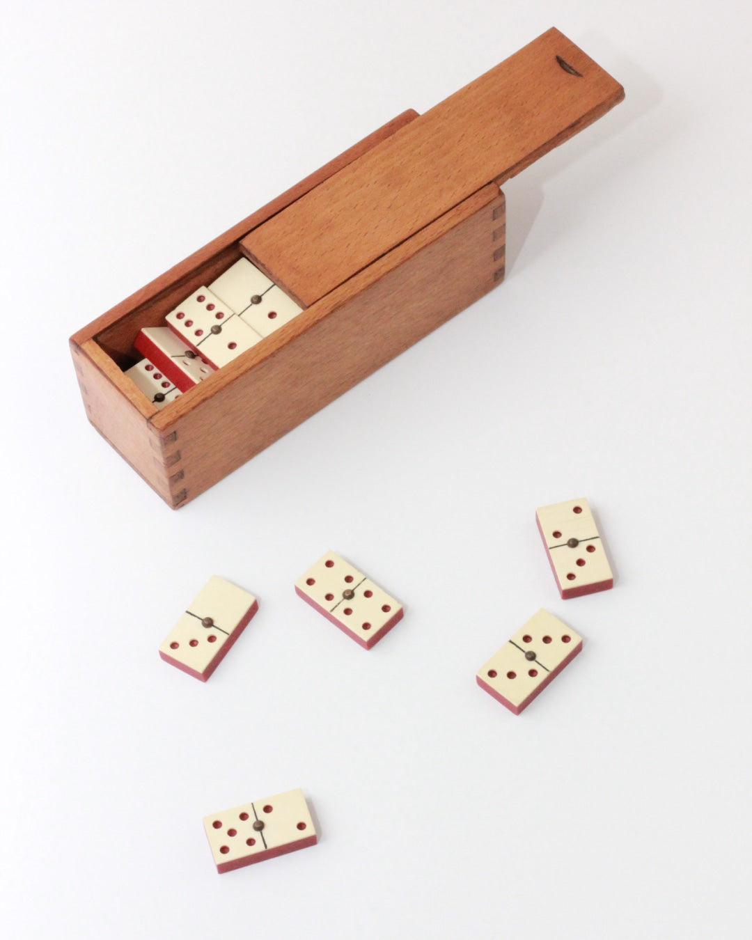 Mini Domino Set — side angle showing wooden box and scattered tiles