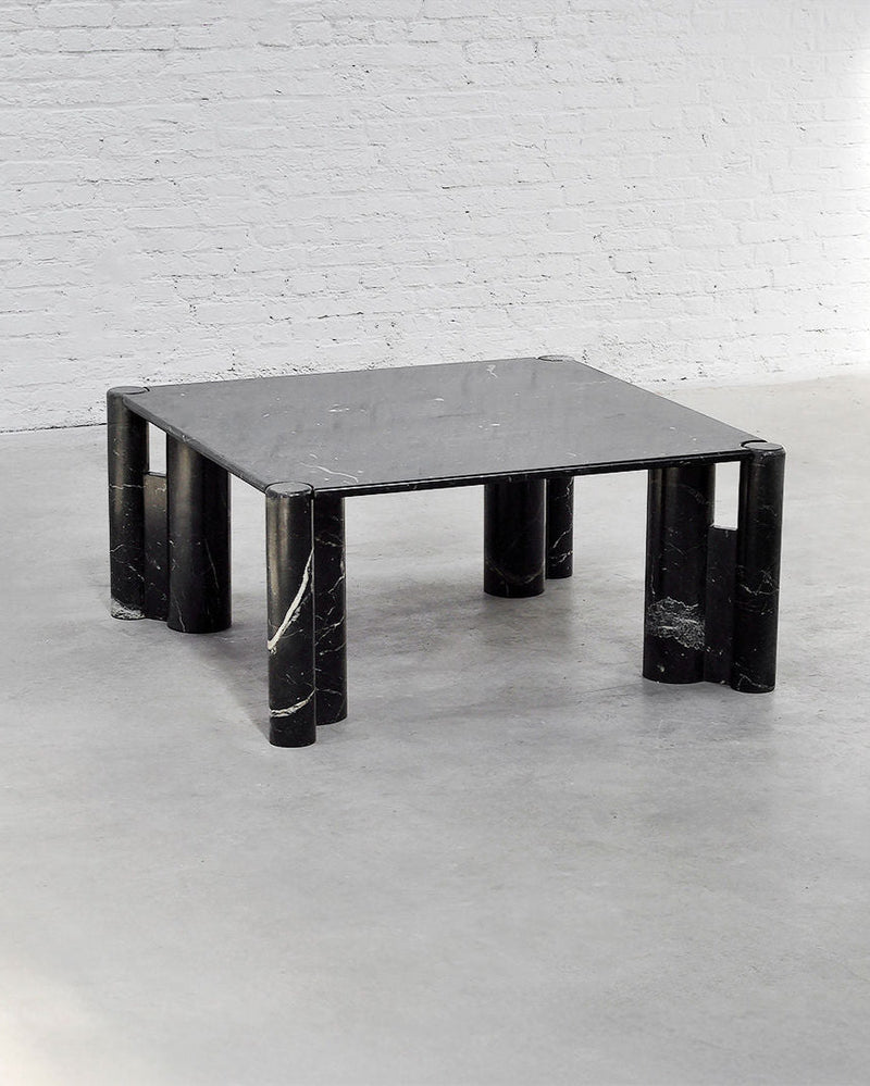 Black marble coffee table with cylindrical legs, Gae Aulenti style