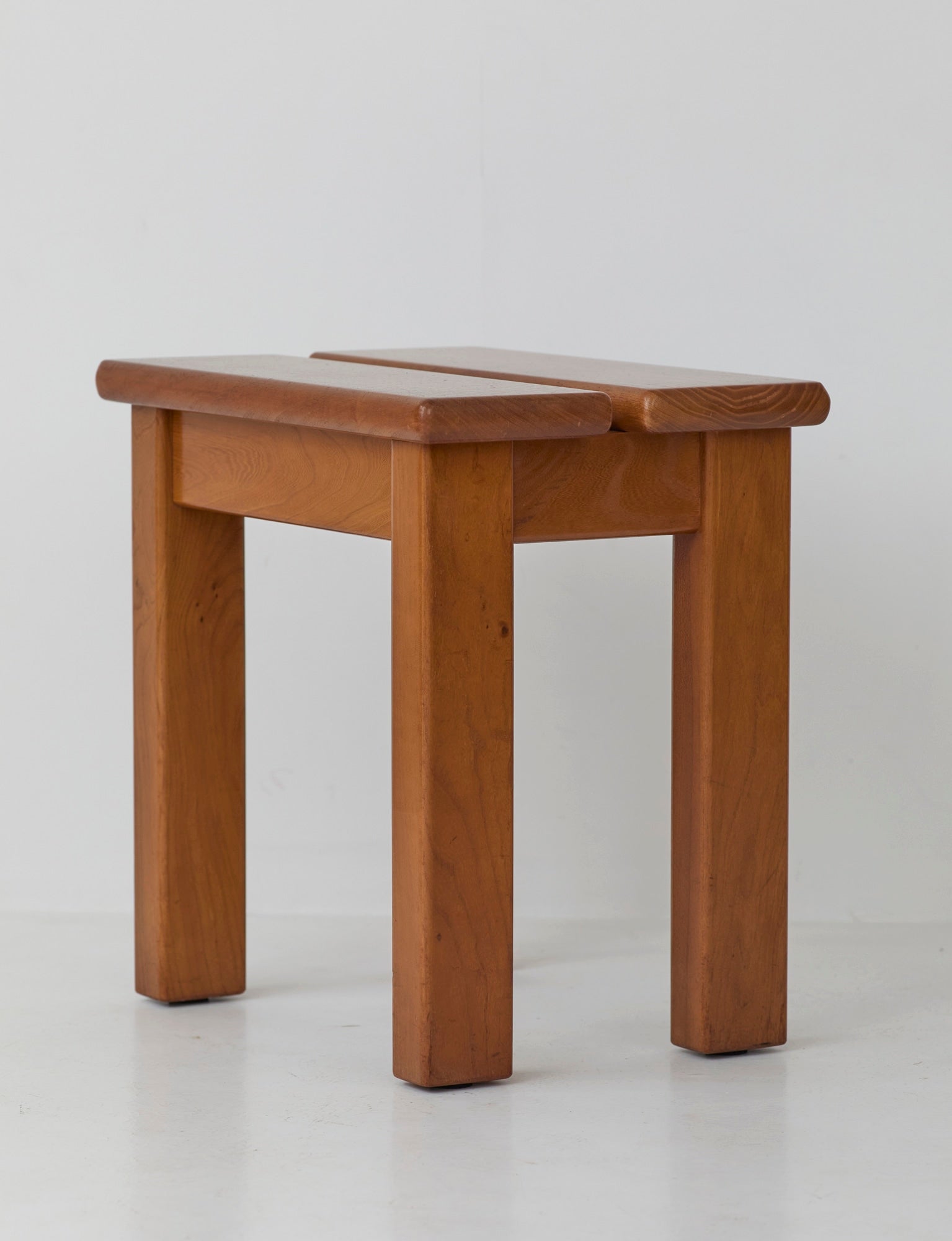 French stool in solid Elm wood by Maison Regain C. 1980 — lifestyle setting