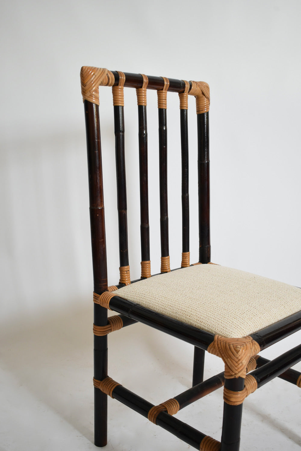 Set of four bicolor rattan chairs, 1970s — lifestyle setting