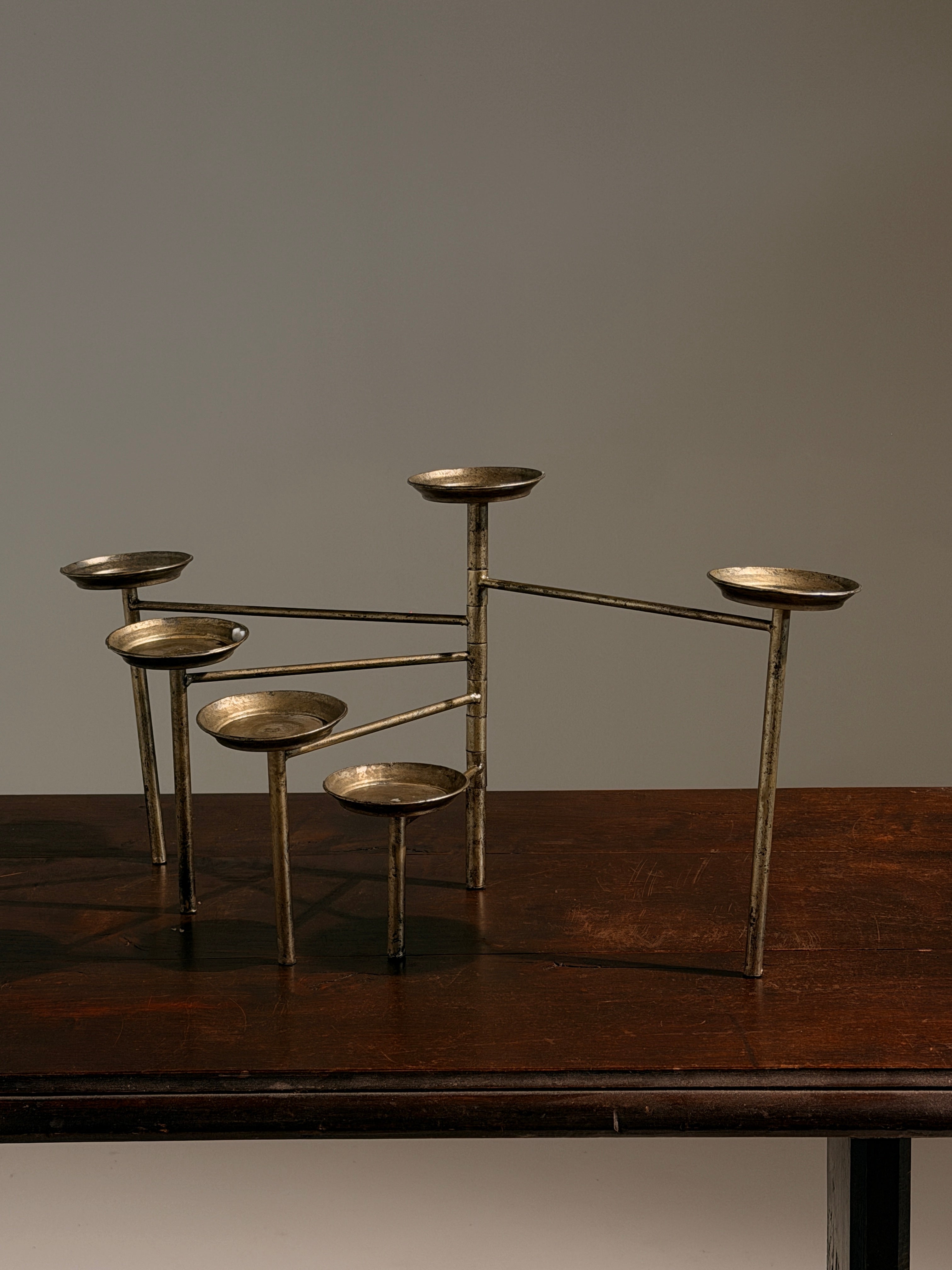 Articulated six-arm candelabra in silver-plated metal, France, circa 1950 — in context