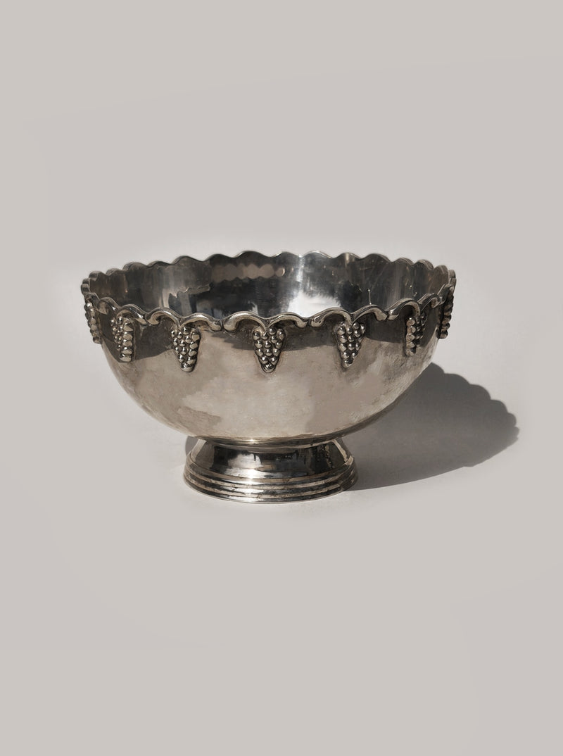 Silver-plated decorative fruit bowl with grape motif border