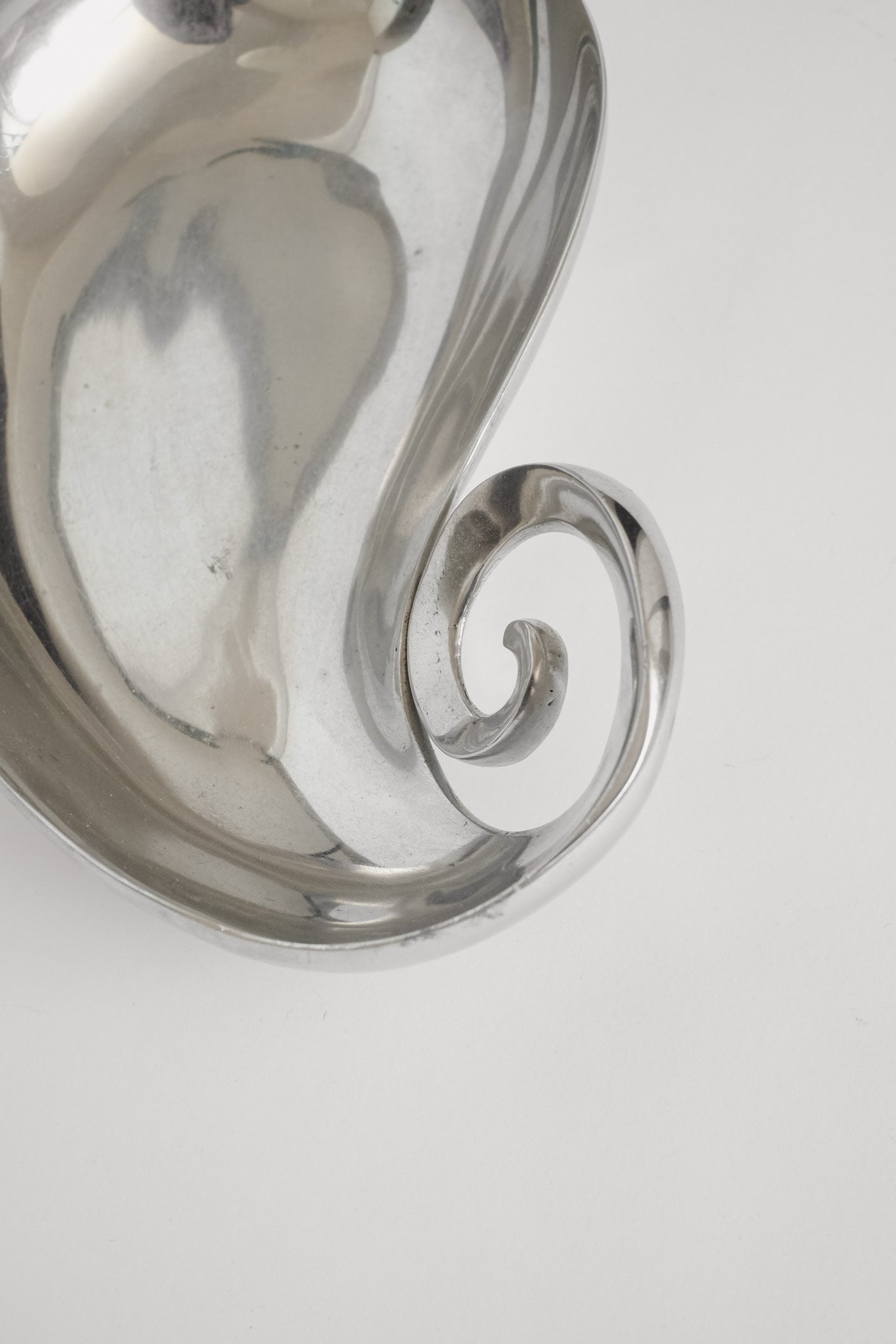Elegant Aluminium Spiral Dish — lifestyle setting