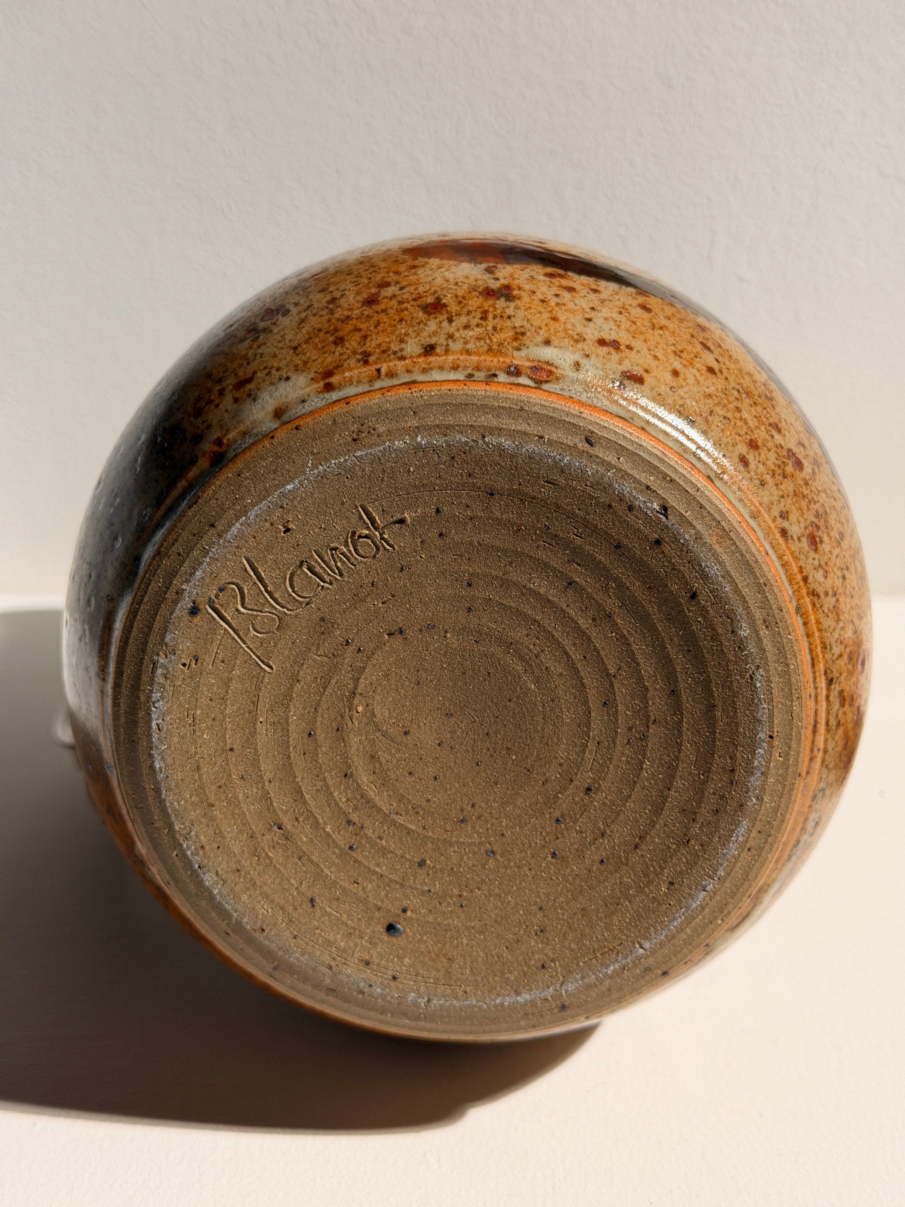 A rare collection of six French studio pottery pitchers — close-up