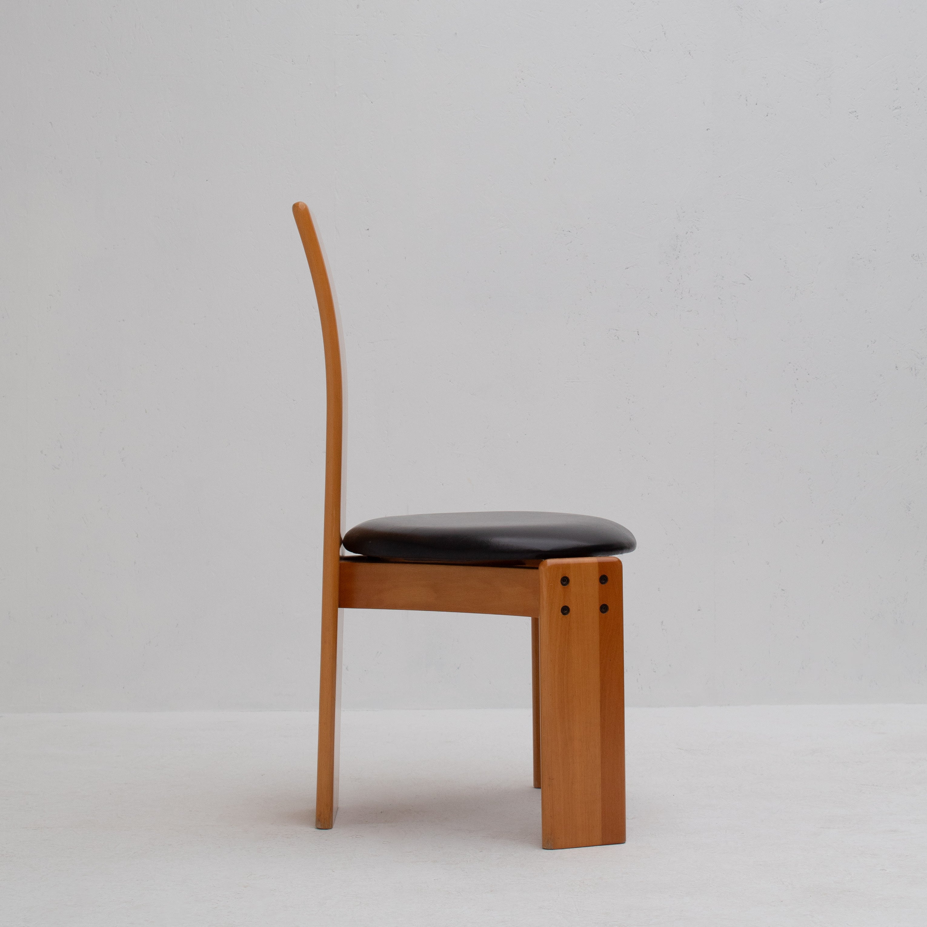 Set of Dining Chairs in Wood and Leather by Mario Marenco for Mobil Girgi — side profile showing wooden frame and leather sea