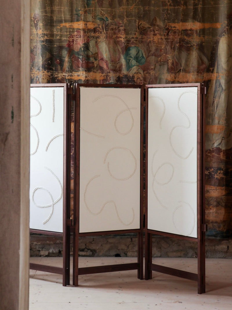 Cavalletto three-panel room divider with geometric pattern screens