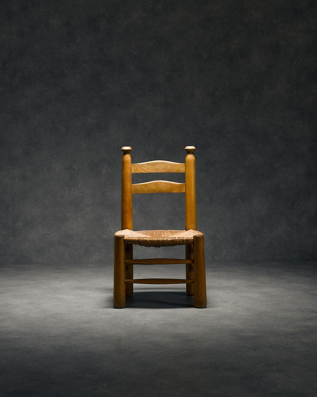 low chair with rush seat, attributed to Charles Dudouyt — detail view