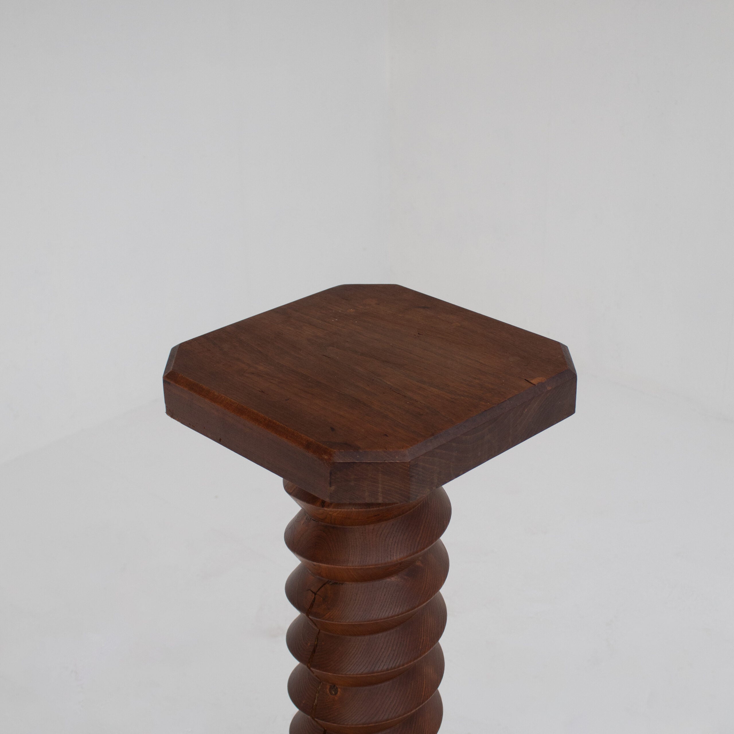 Sculptural Wooden Pillar in Solid Elm with Twisted Geometric Carving — side angle