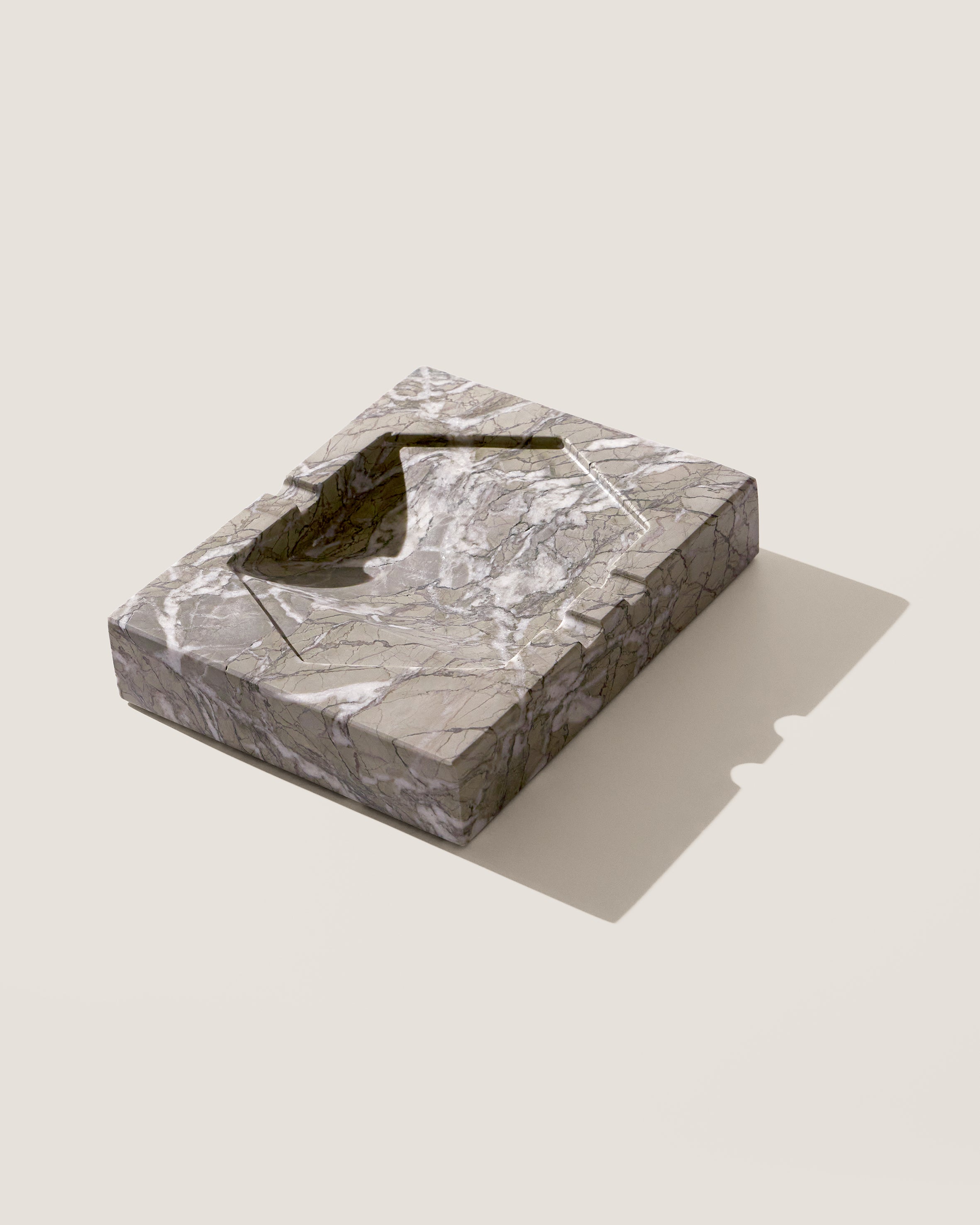 Ame IV Marble Ashtray — close-up of gray marble surface with angular design