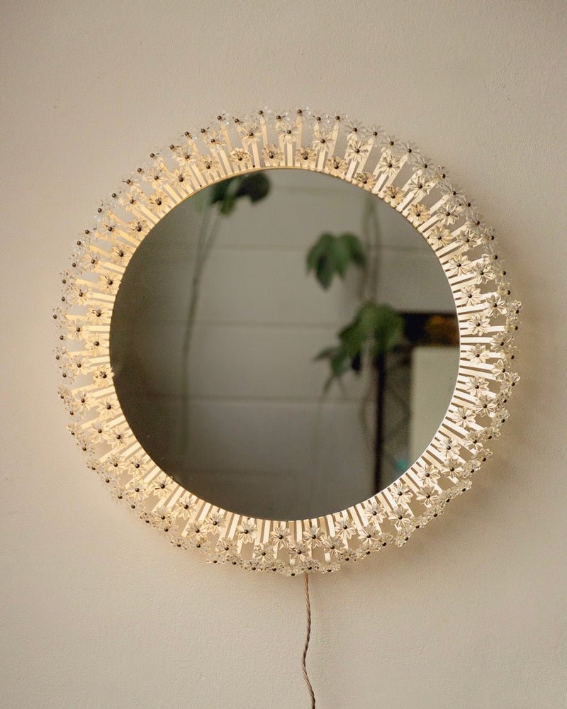Mid Century Backlit Mirror by Emil Stejner — close-up of round mirror with glass accents